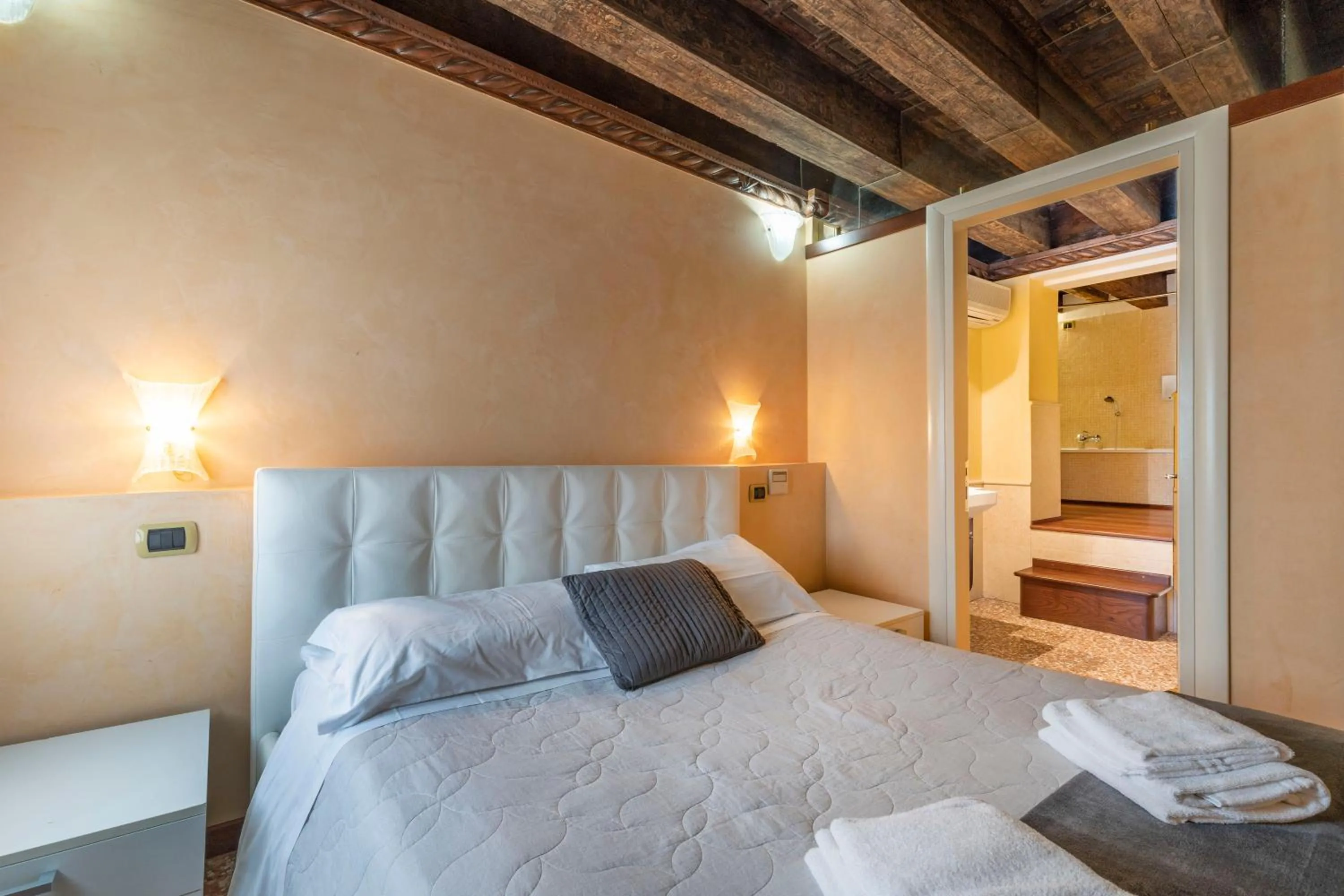 Bed in Doge Morosini Palace by Wonderful Italy