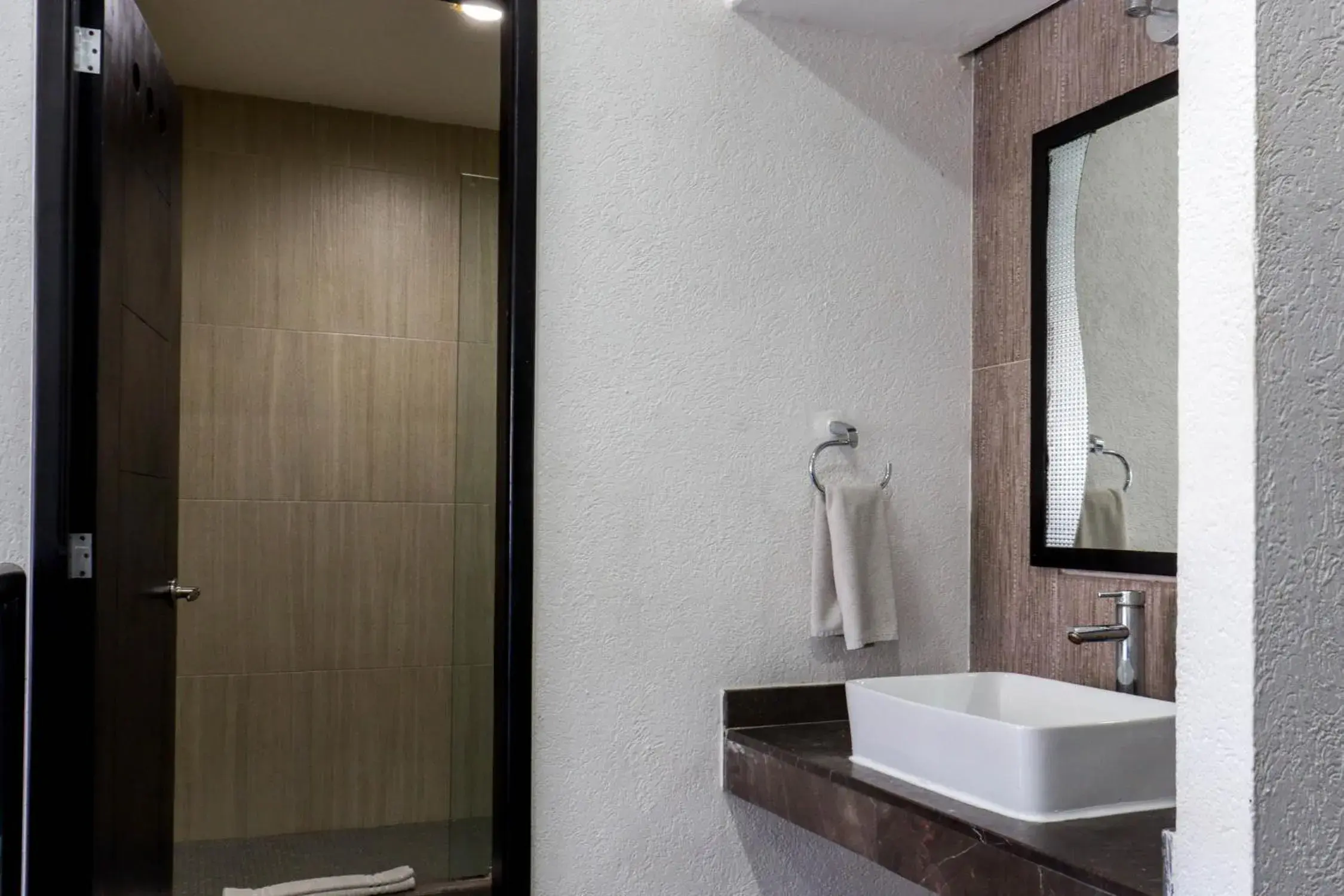 Bathroom in Hotel MX portal maya Bathroom in Hotel MX portal maya