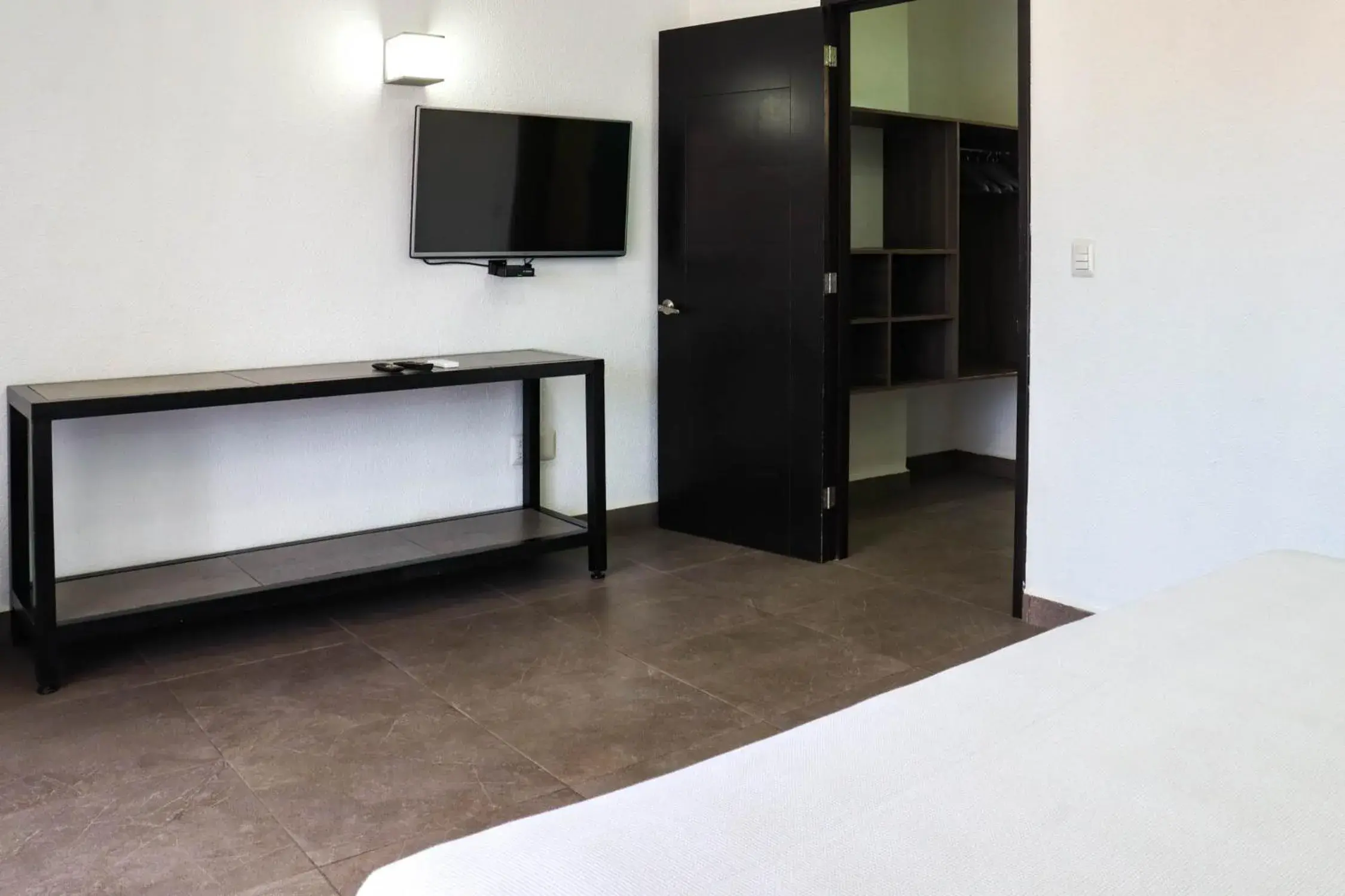 Communal lounge/ TV room, Bed in Hotel MX portal maya Communal lounge/ TV room, Bed in Hotel MX portal maya