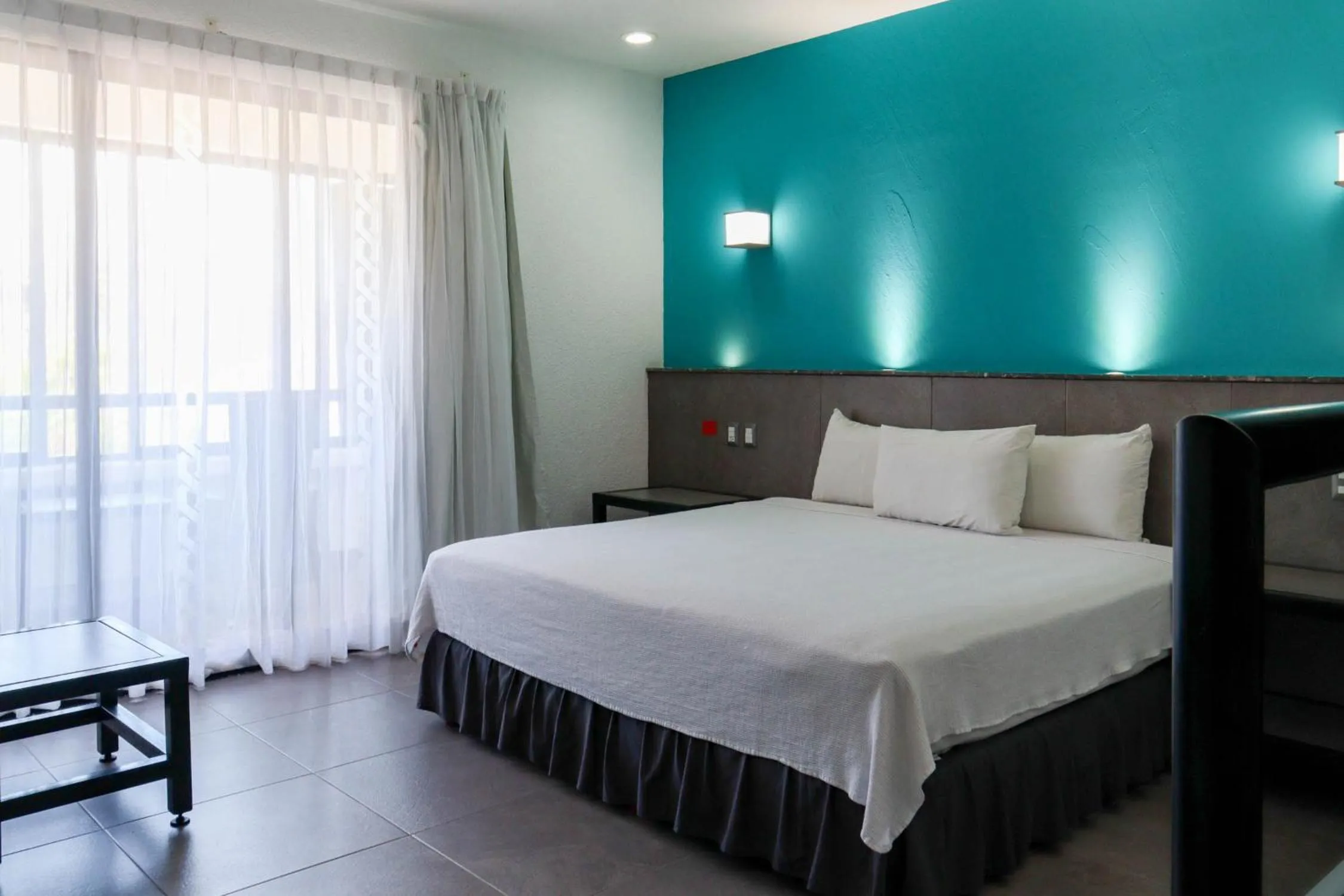 Photo of the whole room, Bed in Hotel MX portal maya