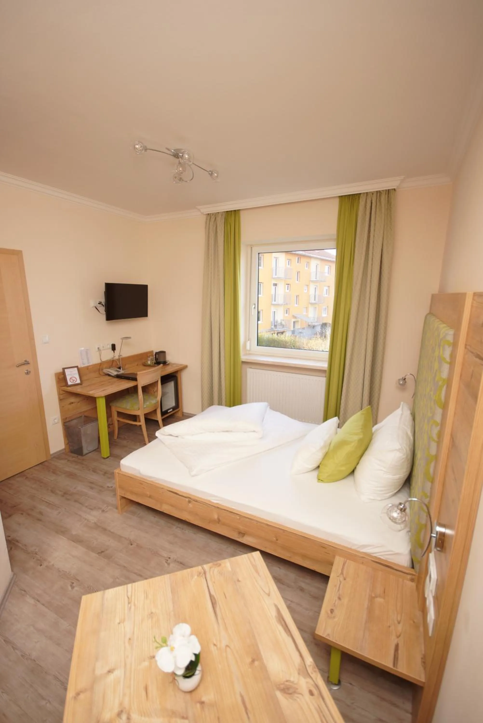 Photo of the whole room, Bed in Der Marienhof Hotel Garni