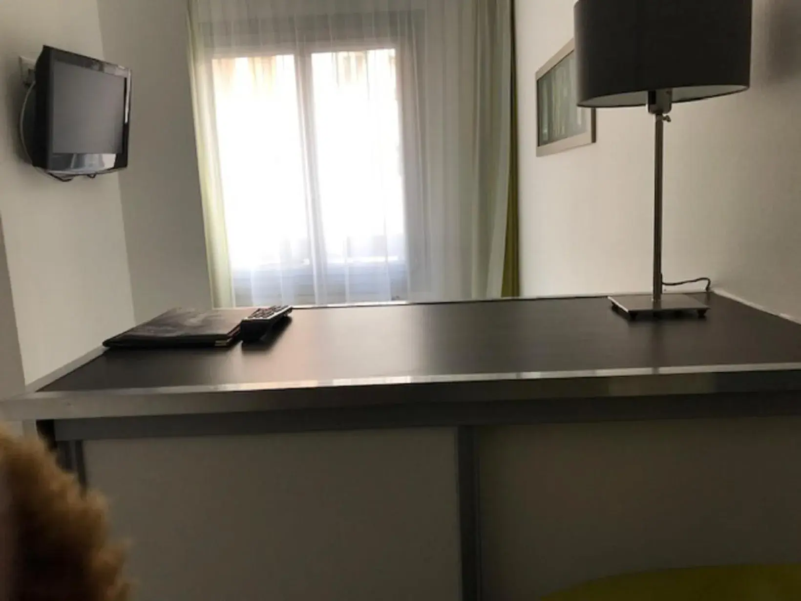 Photo of the whole room in Hôtel Le Cousture Photo of the whole room in Hôtel Le Cousture