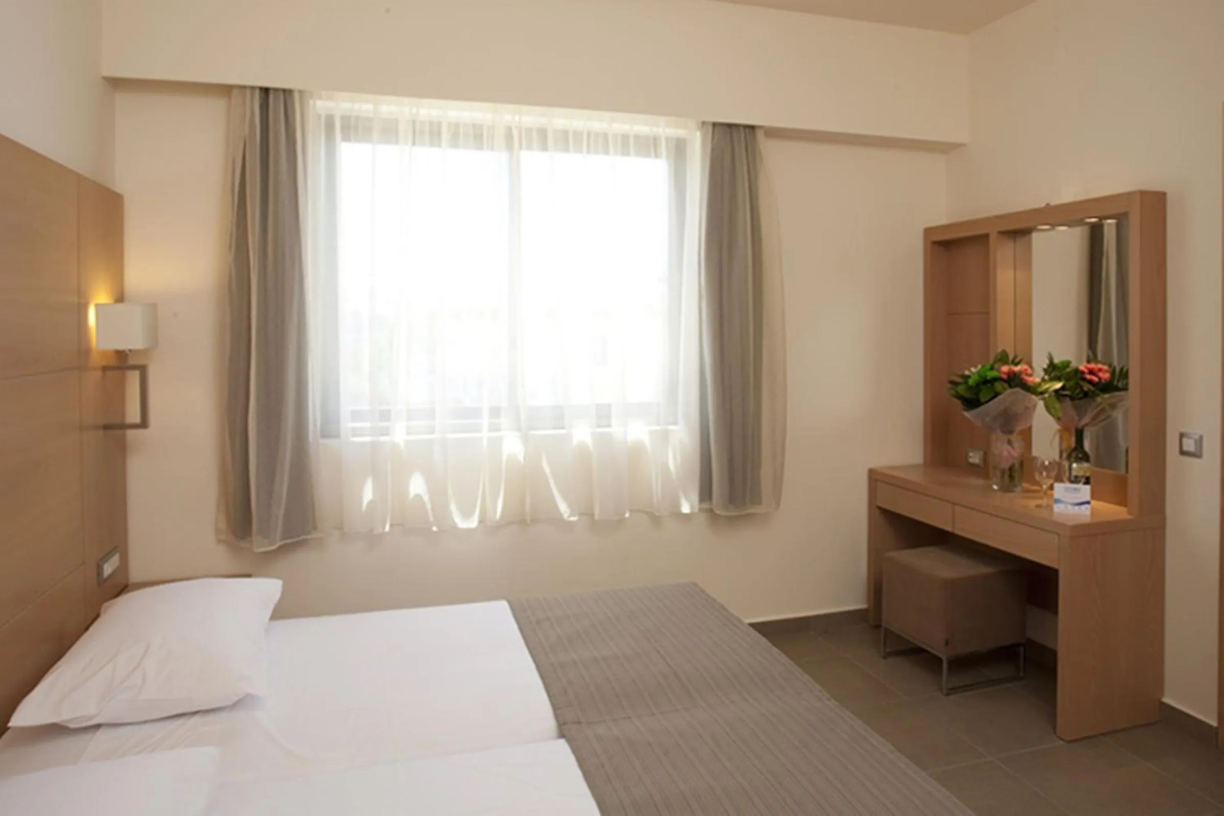 Bed in Island Blue Hotel