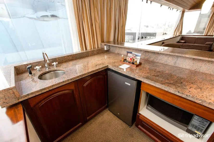 Kitchen or kitchenette in J&A Classic Hotel