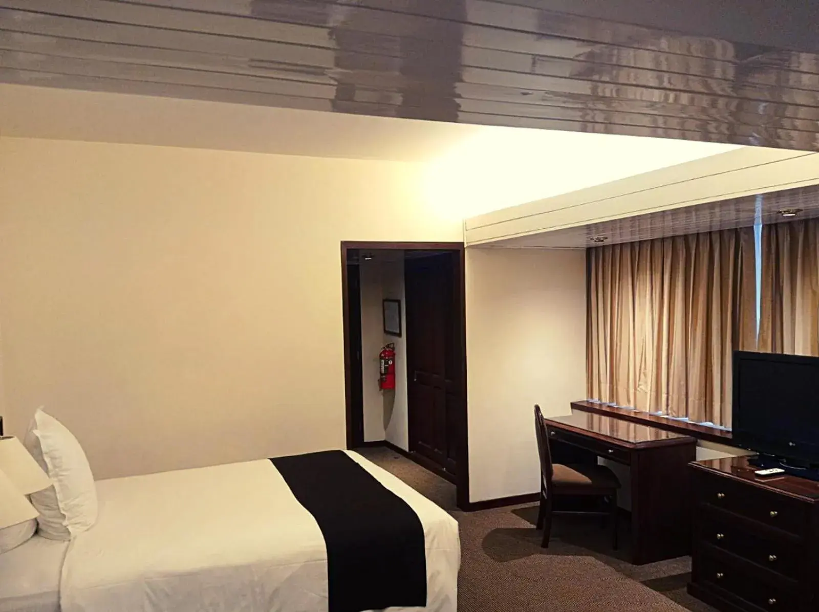 Bed in J&A Classic Hotel Bed in J&A Classic Hotel