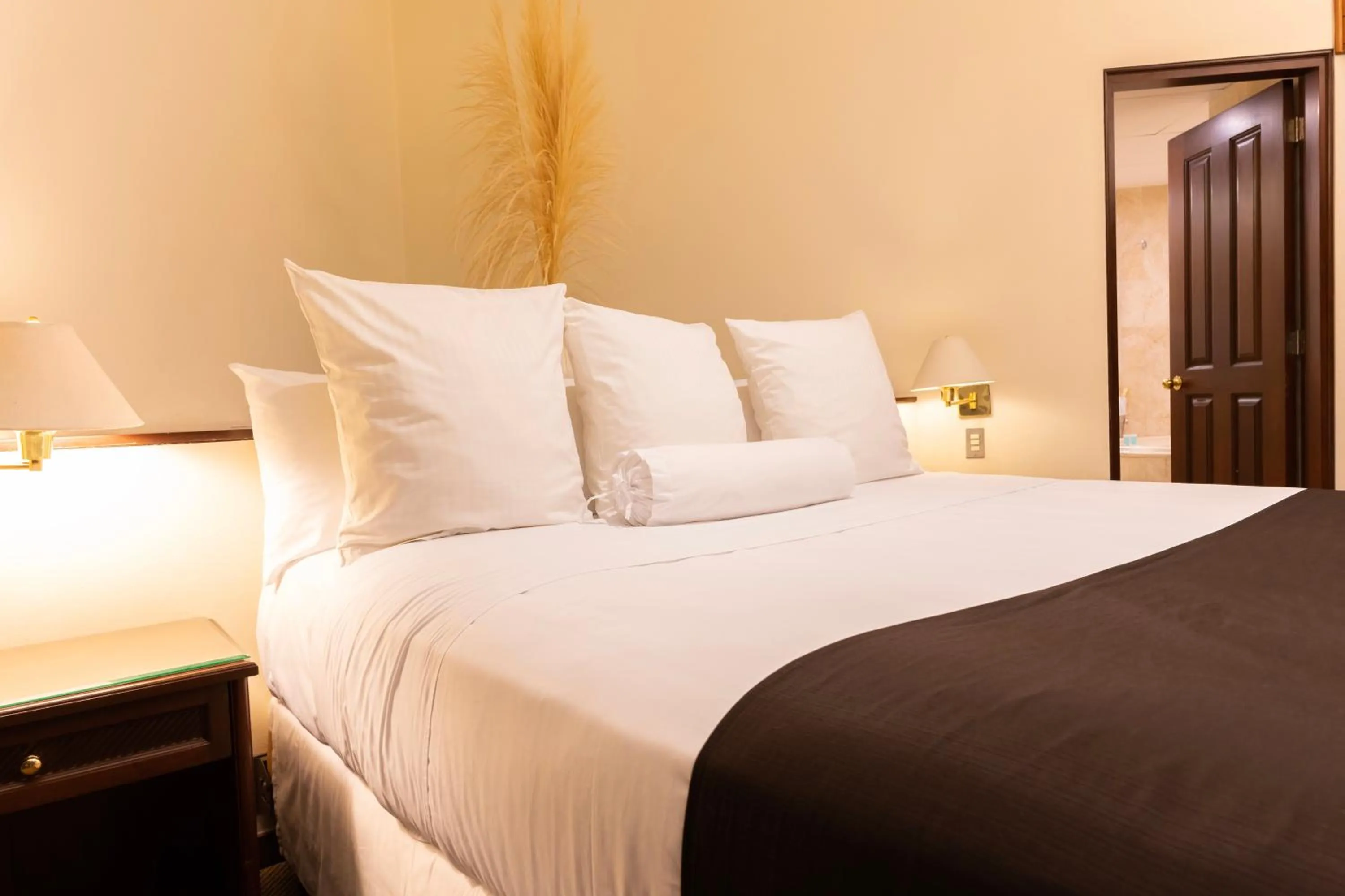 Bed in J&A Classic Hotel