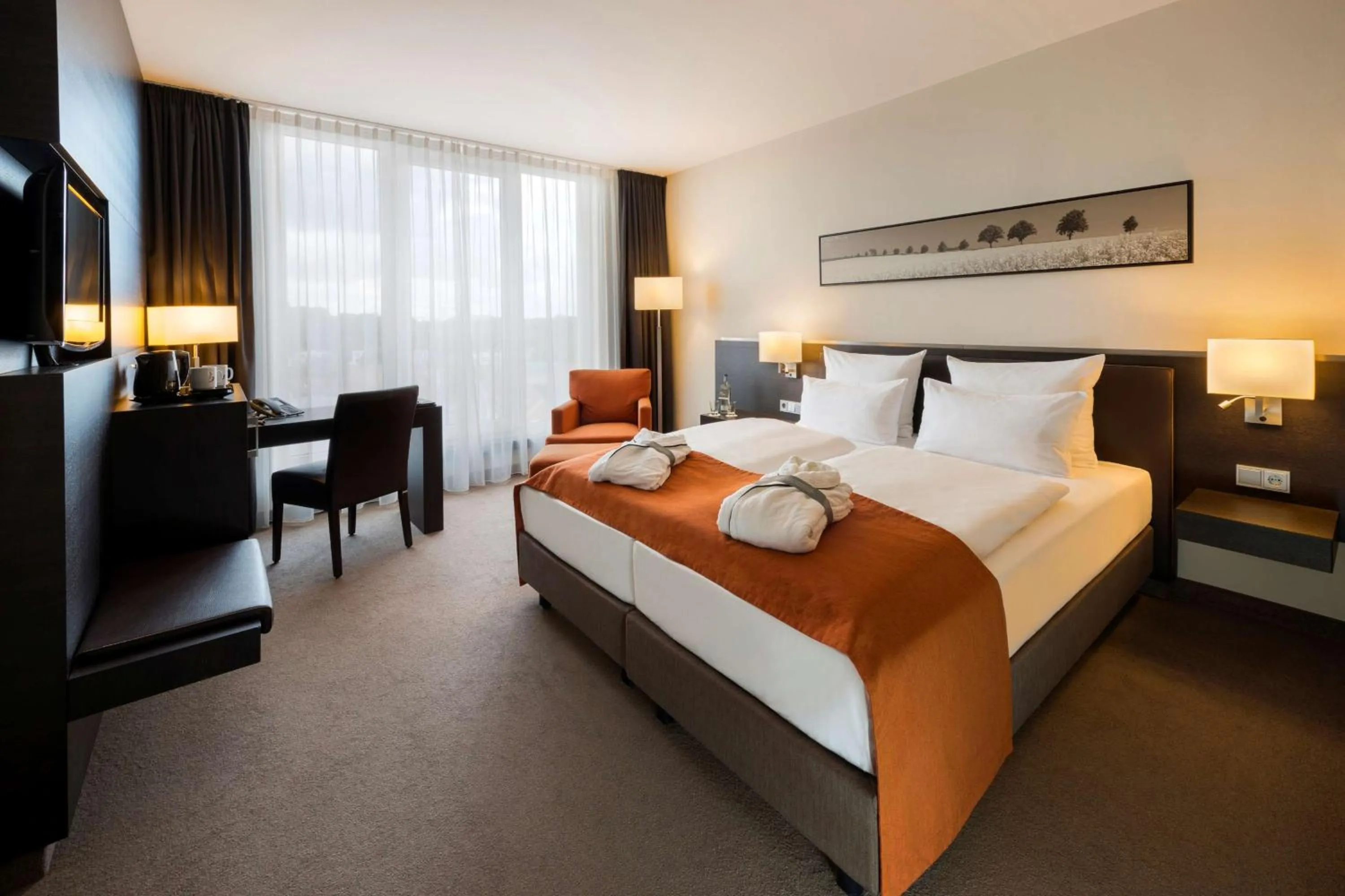 Photo of the whole room, Bed in ATLANTIC Hotel Lübeck