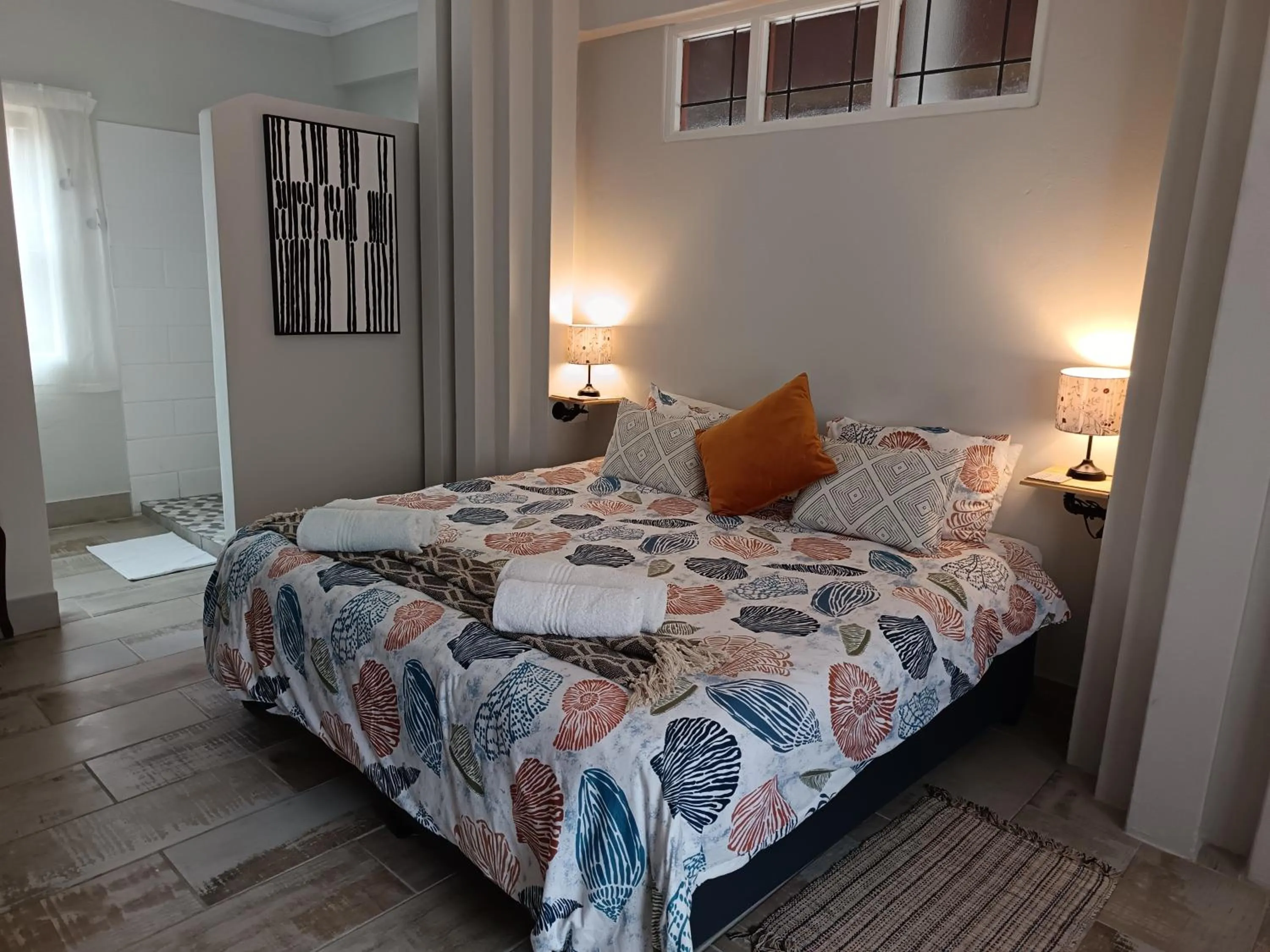 Bed in Bluewater Guesthouse