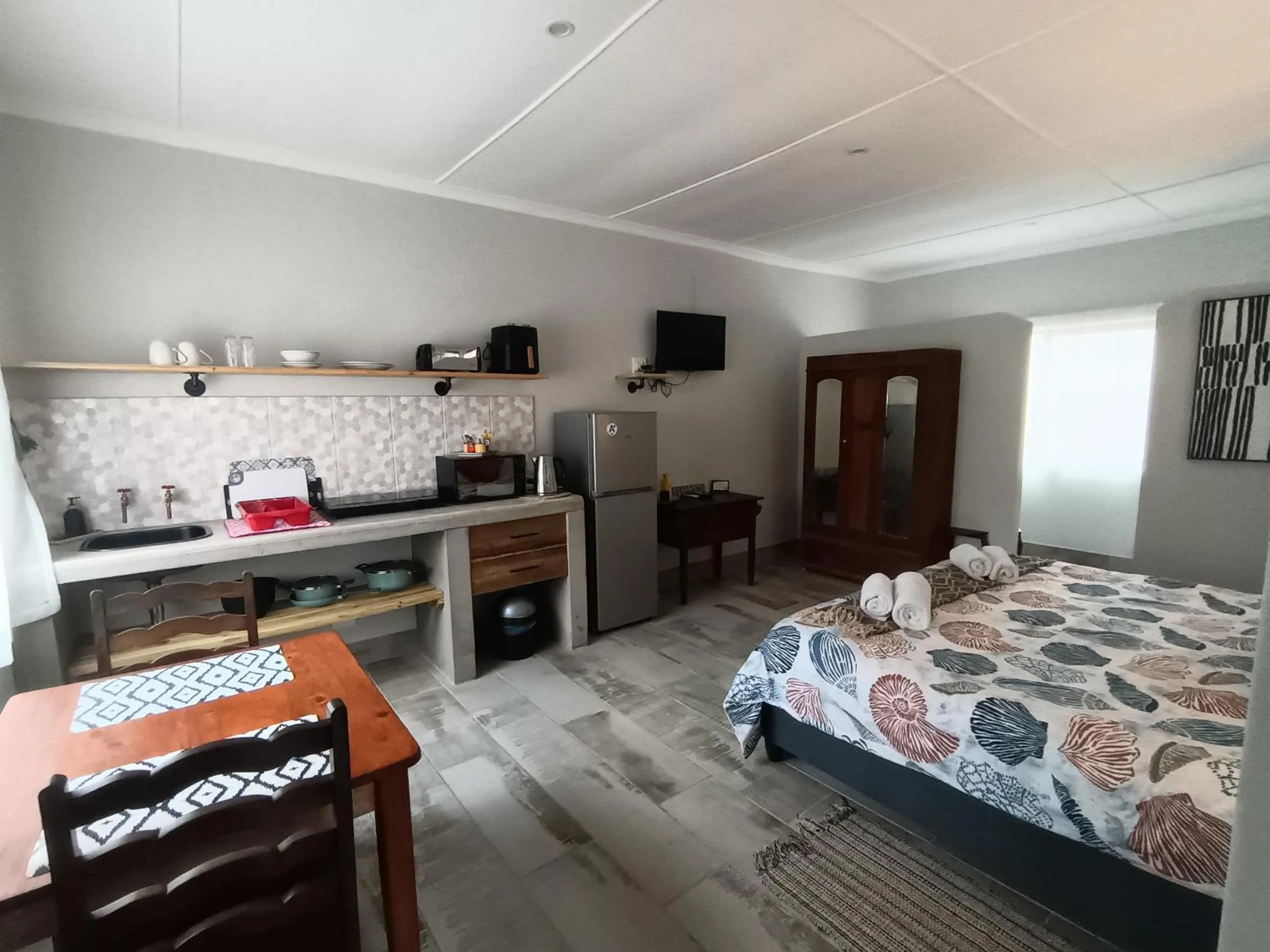 Bed in Bluewater Guesthouse