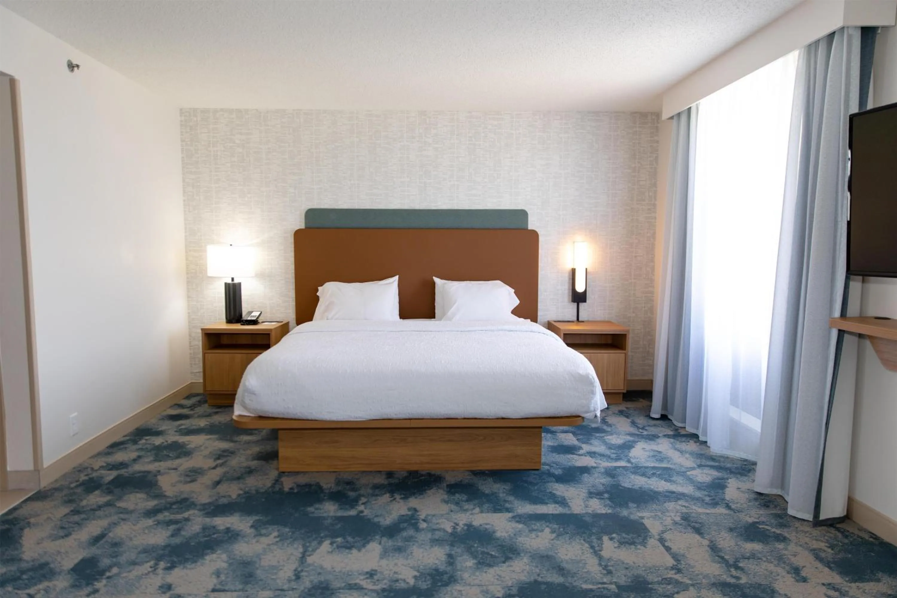 Bed in Hampton Inn & Suites Jennings