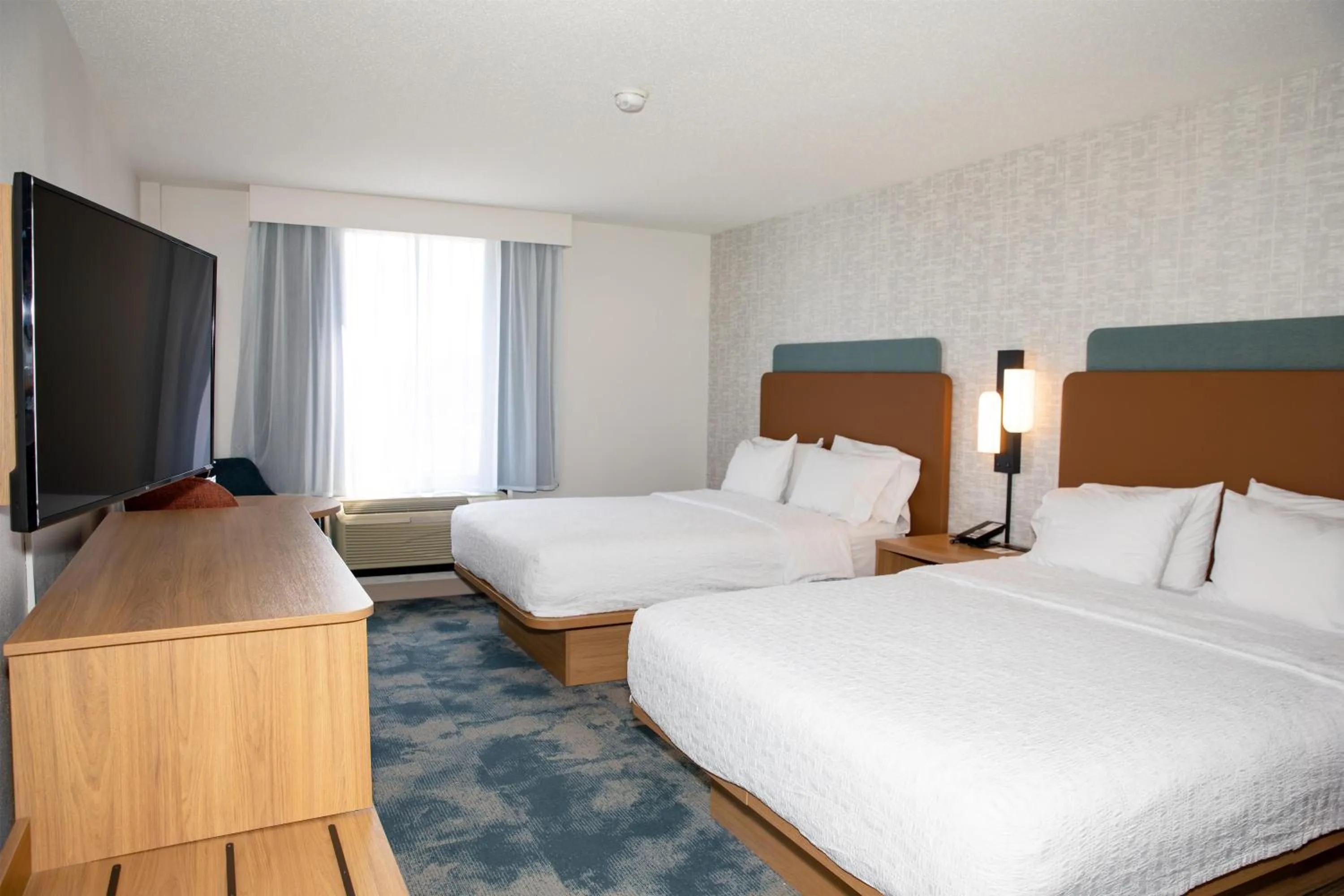 Bed in Hampton Inn & Suites Jennings