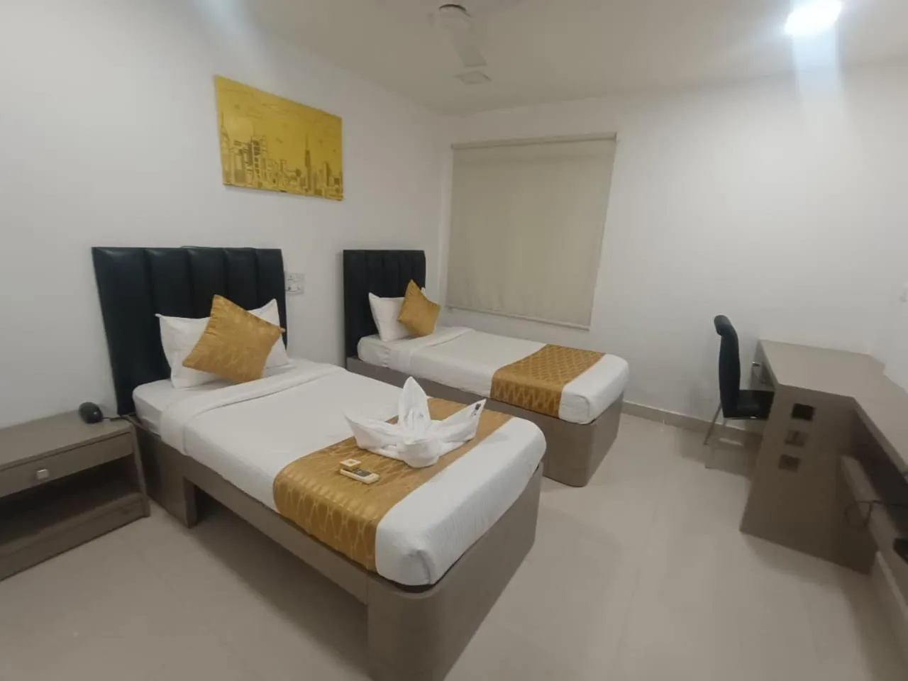 Bed in La Riviera Suites
