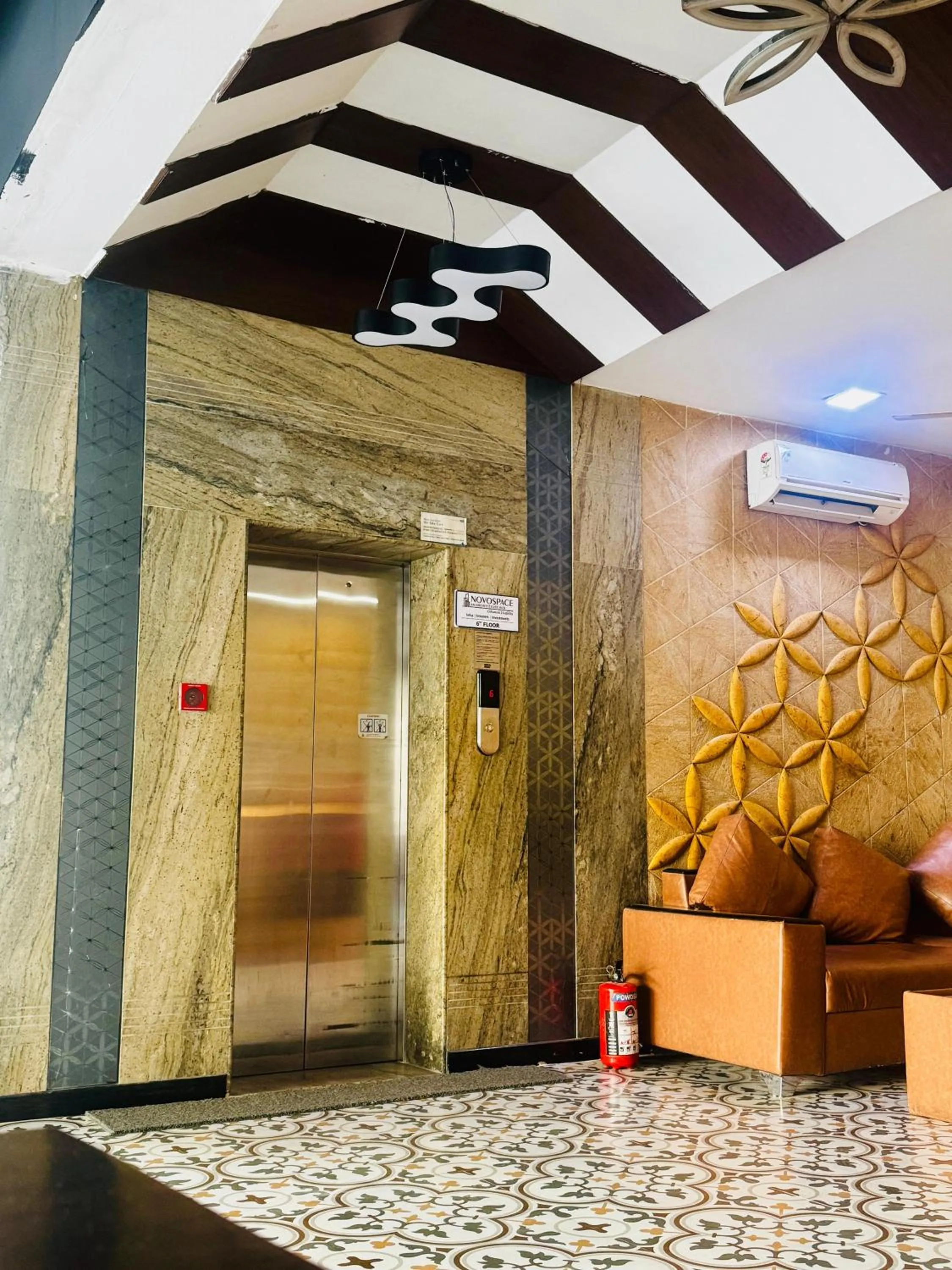 elevator in La Riviera Suites