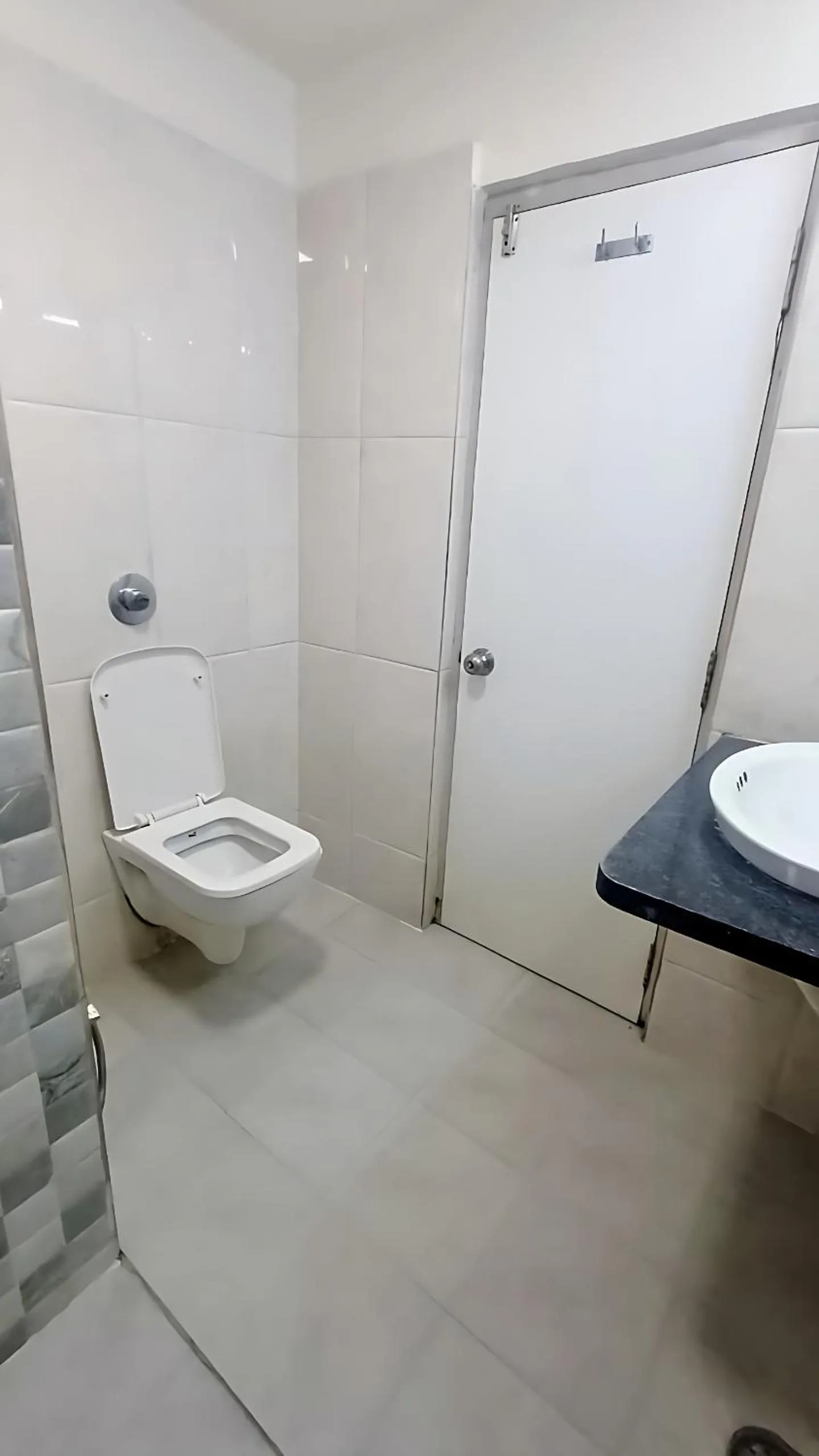 Toilet in La Riviera Suites