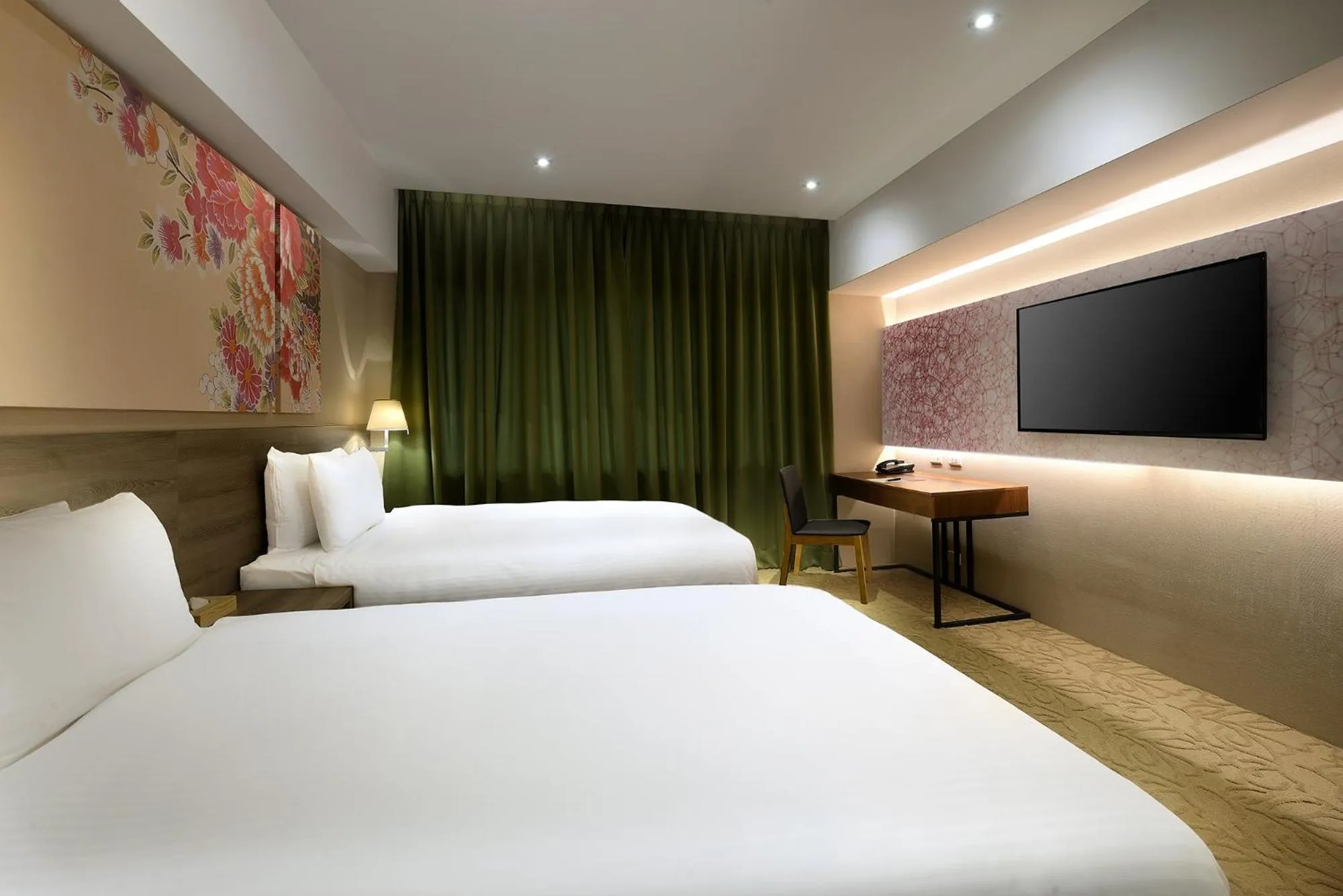 Bed in Aeris International Hotel
