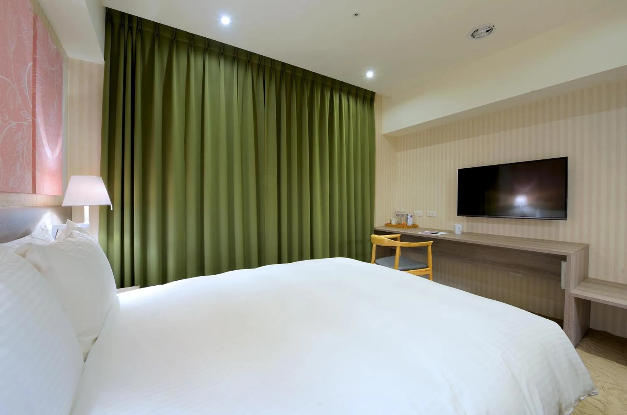 Bed in Aeris International Hotel