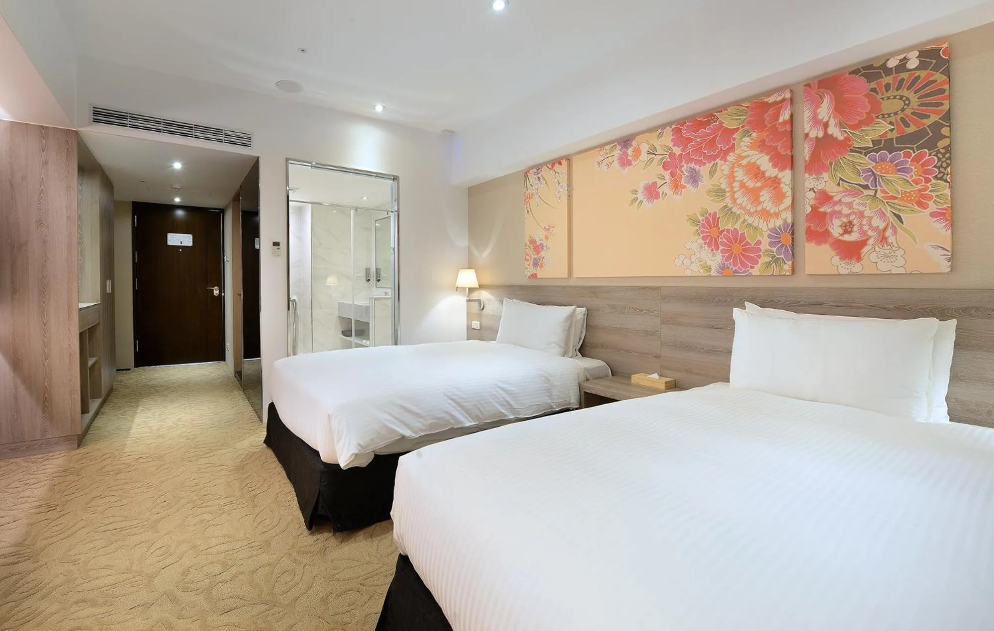 Bed in Aeris International Hotel