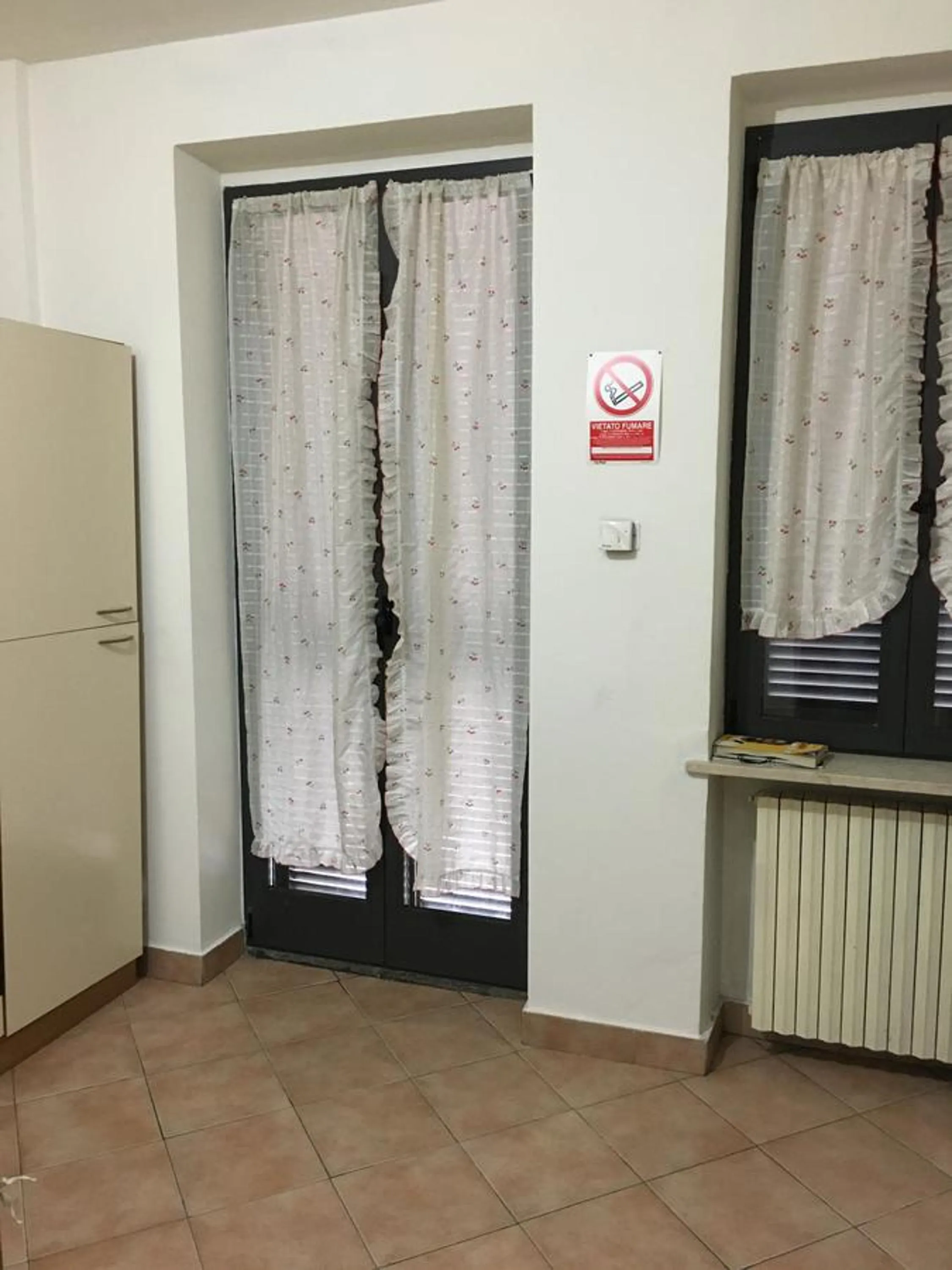 Communal lounge/ TV room in B&B Libertà