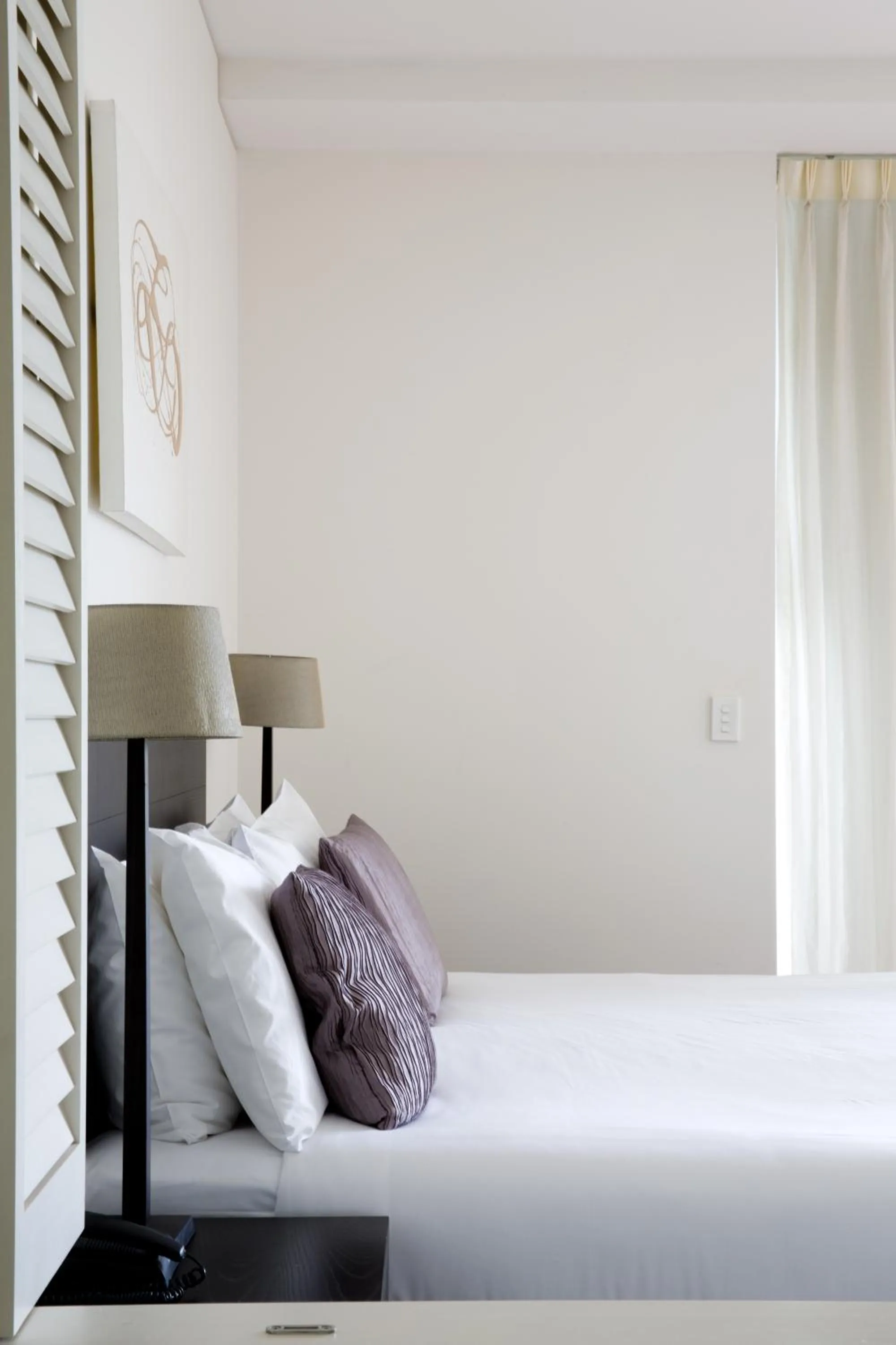 Decorative detail, Bed in Cairns Private Apartments