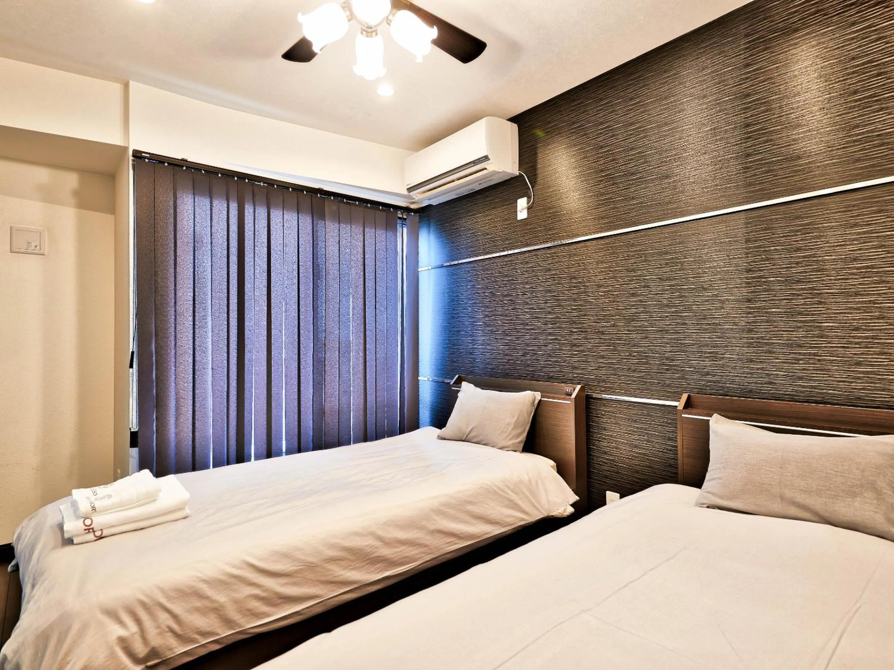 Bed in Terrace Resort Shintoshin