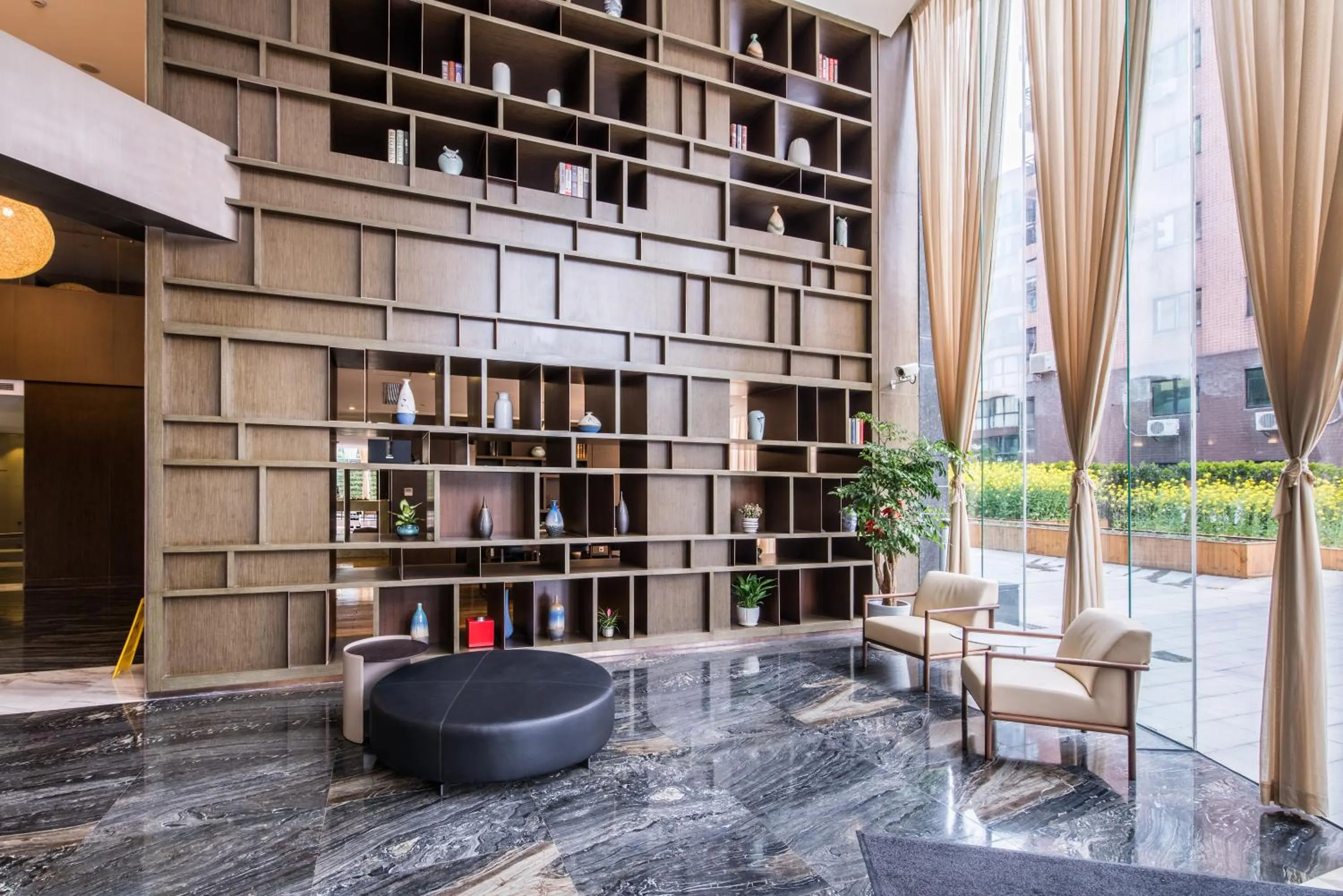 Lobby or reception in Green Court Residence Jinqiao Diamond Shanghai