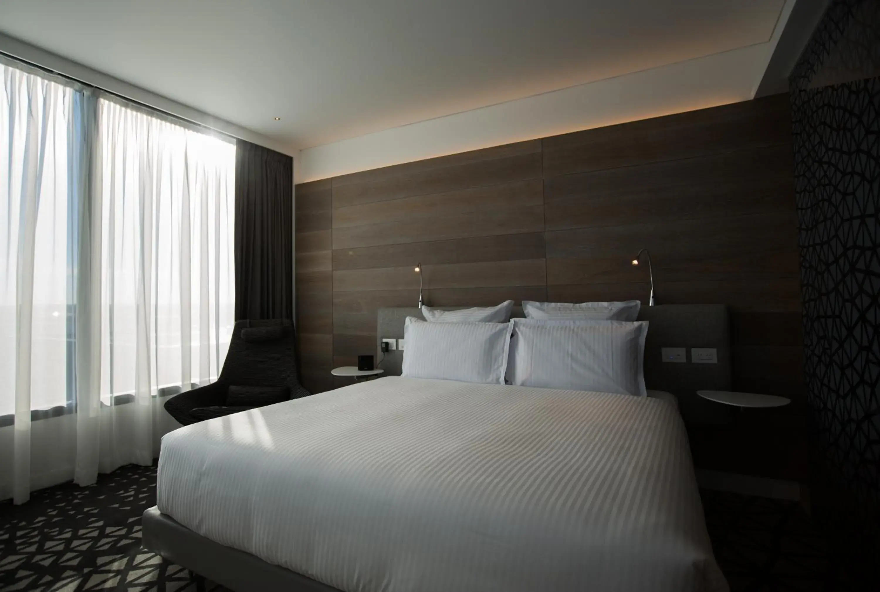 Quiet street view, Bed in Pullman Sydney Airport Quiet street view, Bed in Pullman Sydney Airport