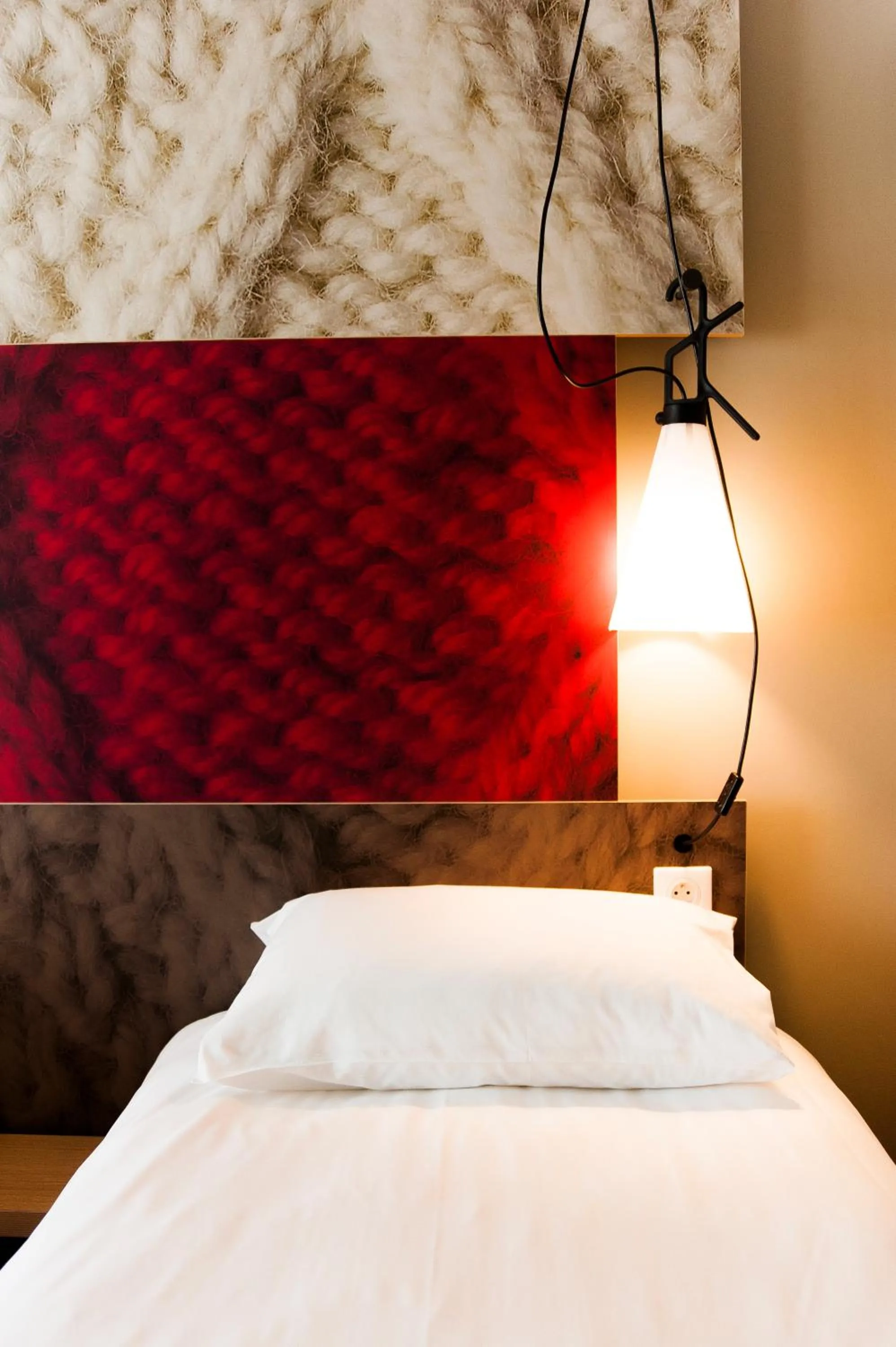 Decorative detail, Bed in Ibis Poznan Polnoc