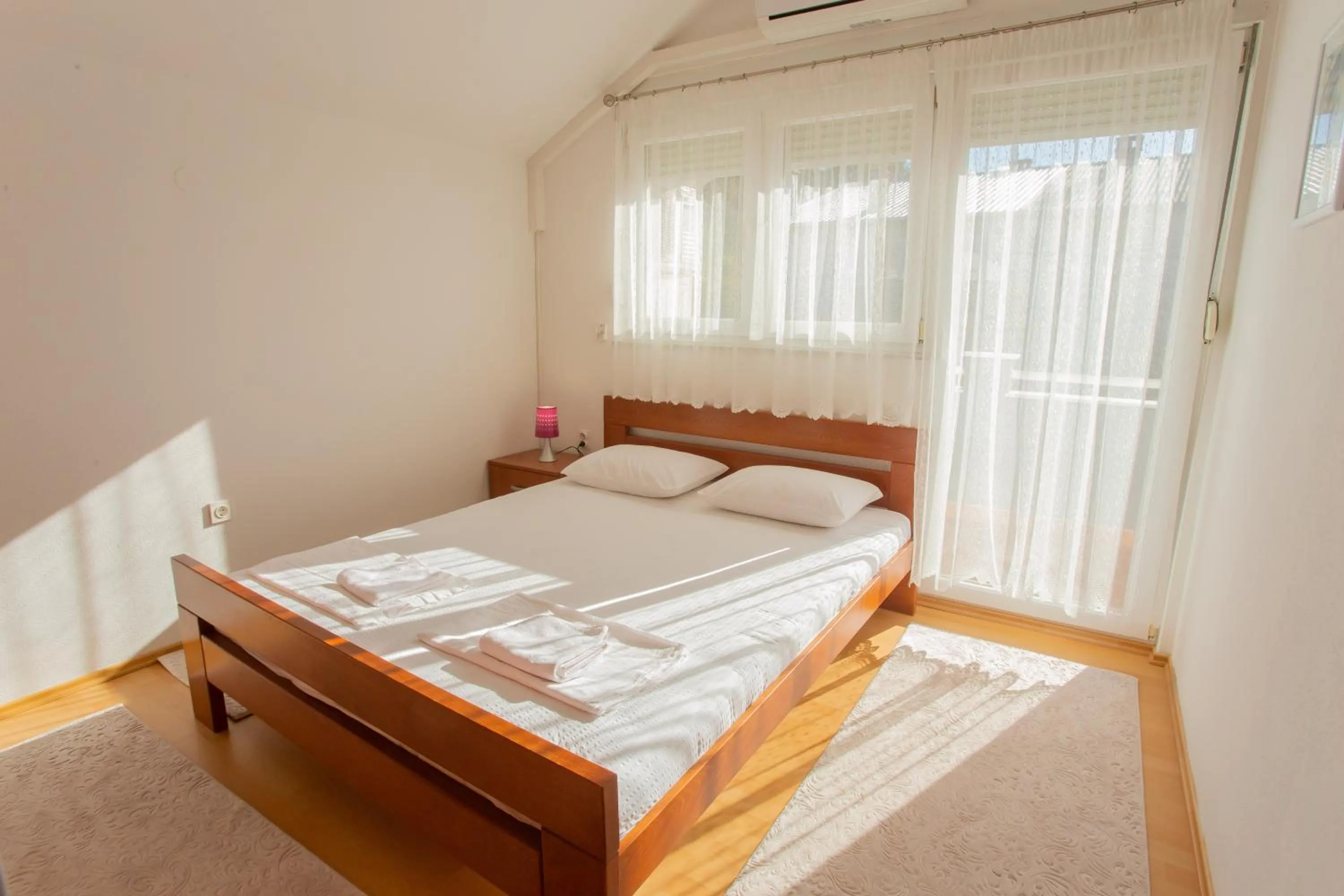 Bed in Guesthouse Aurora