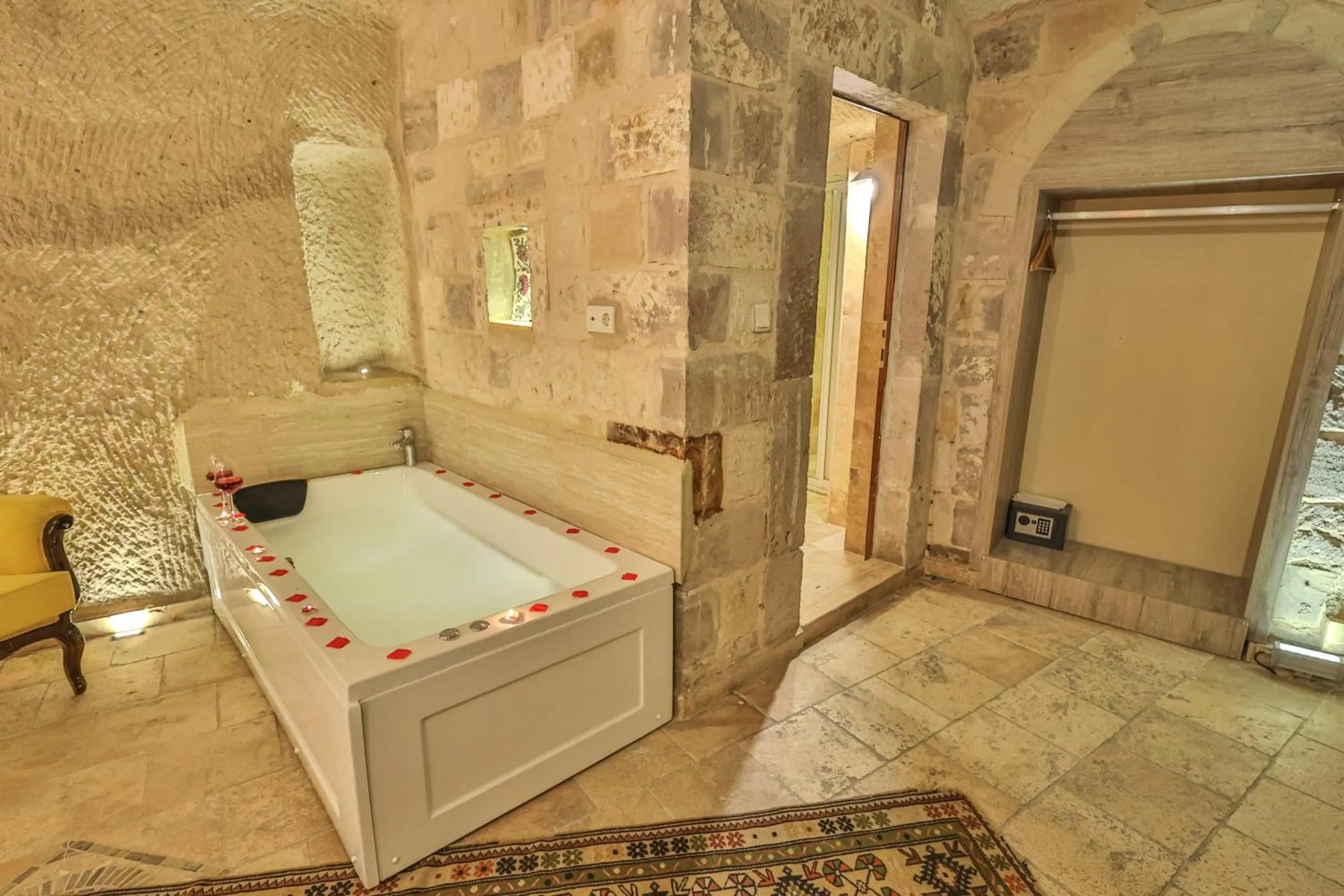 Bed in Bedrock Cave Hotel