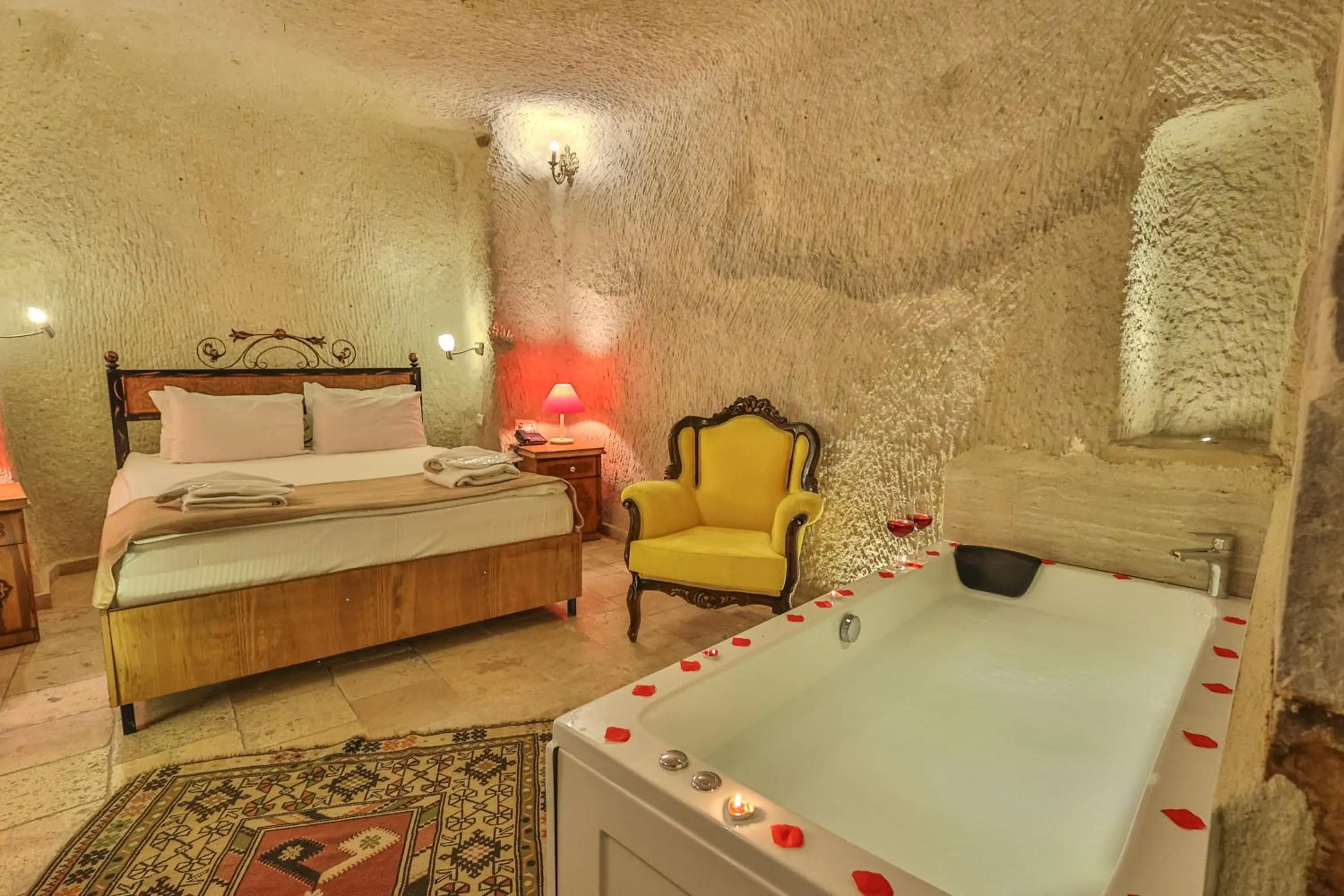 Bed in Bedrock Cave Hotel