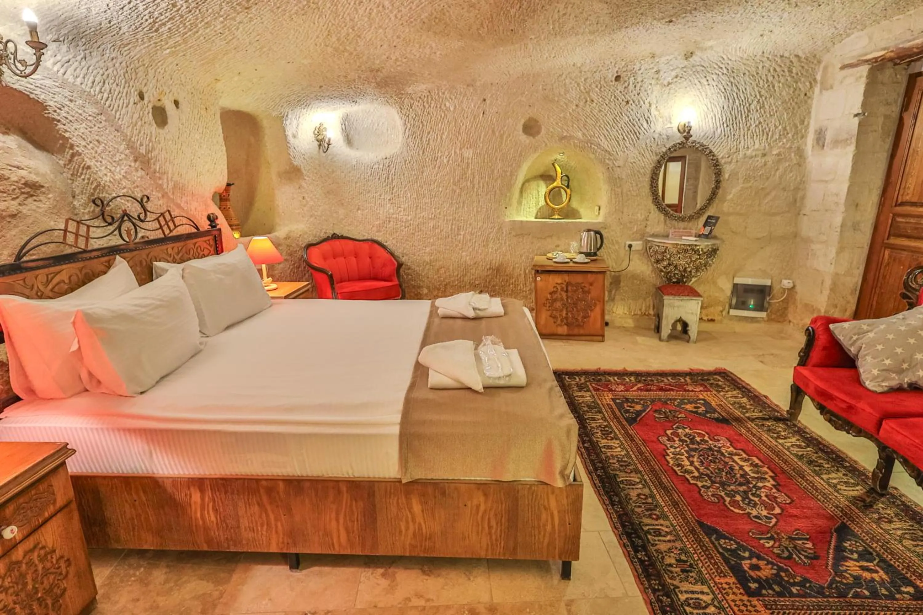 Bed in Bedrock Cave Hotel