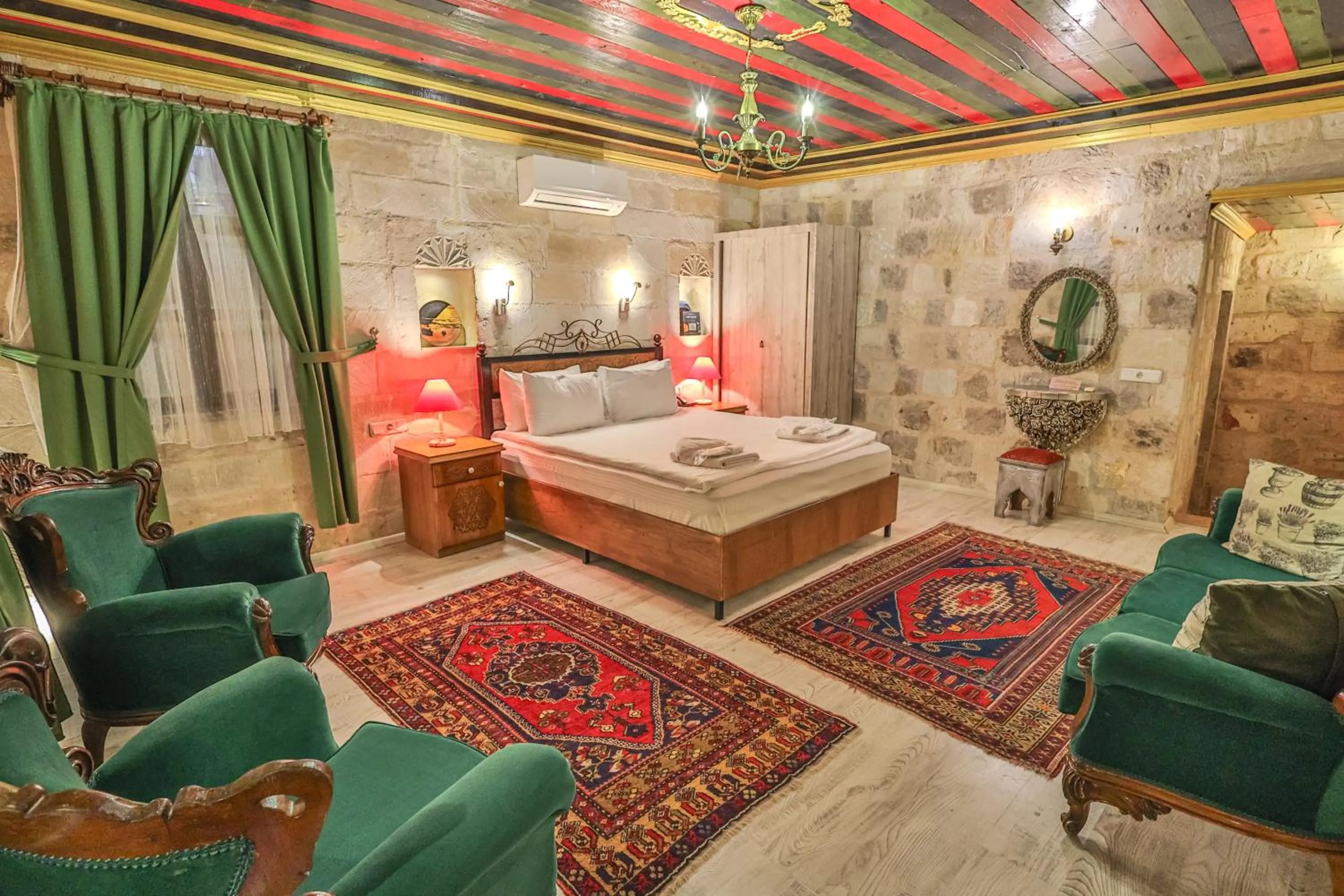 Bed in Bedrock Cave Hotel