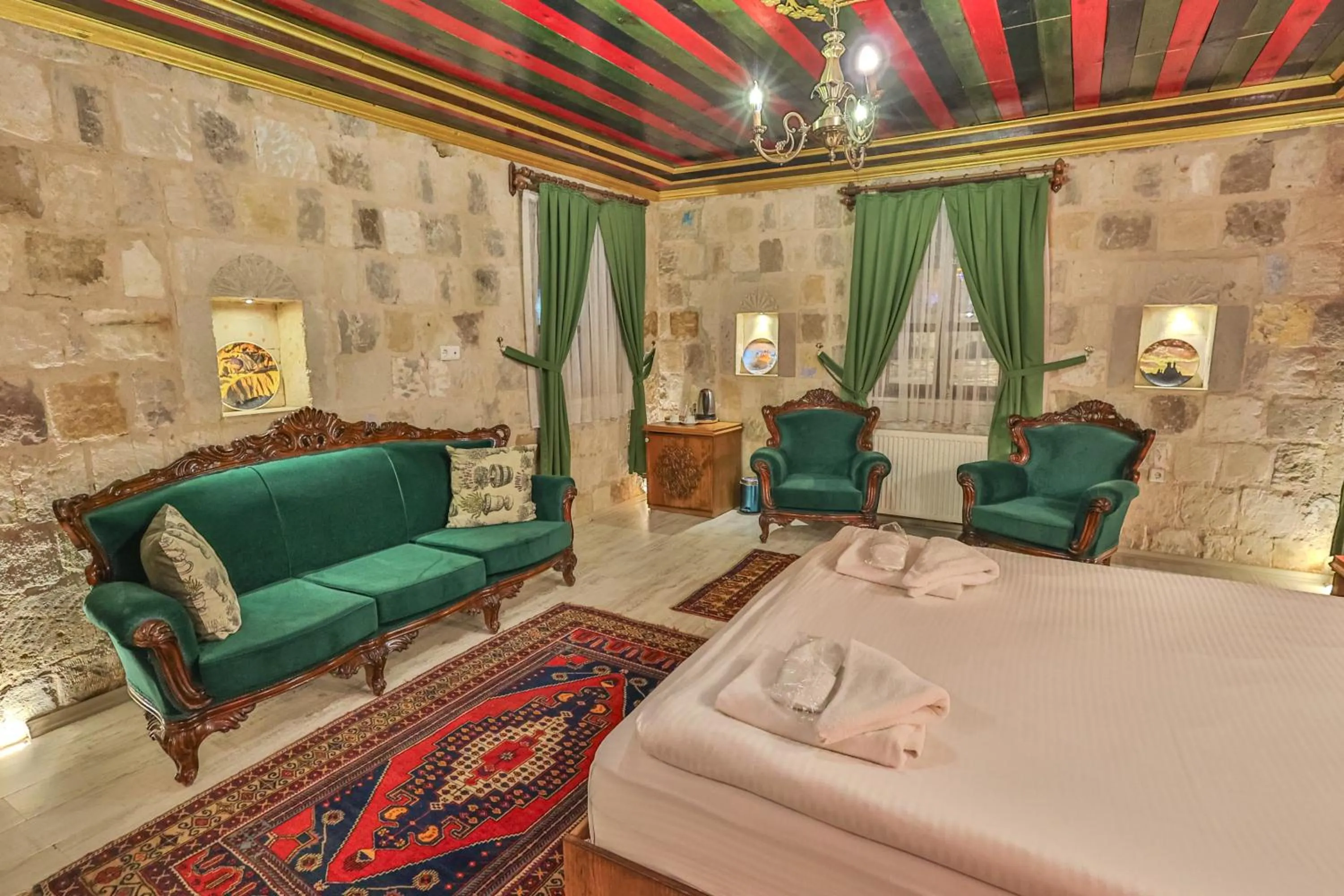 Bed in Bedrock Cave Hotel