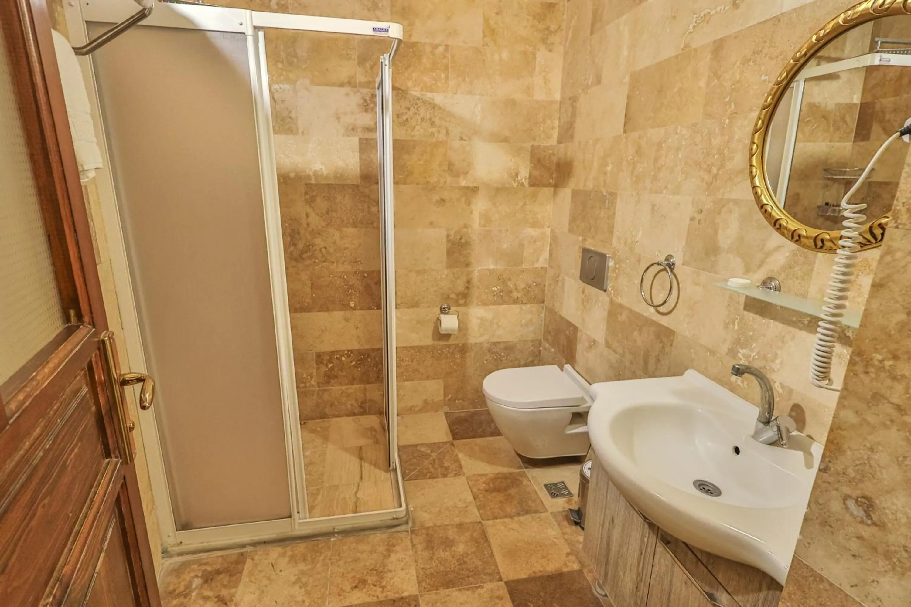 Shower in Bedrock Cave Hotel