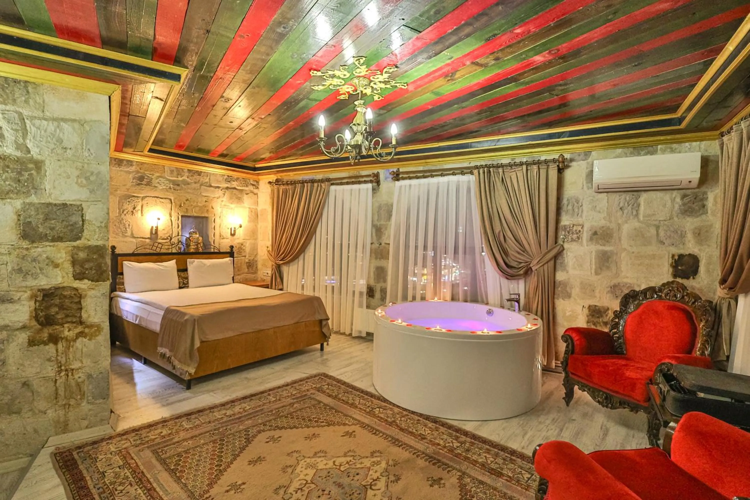 Bed in Bedrock Cave Hotel