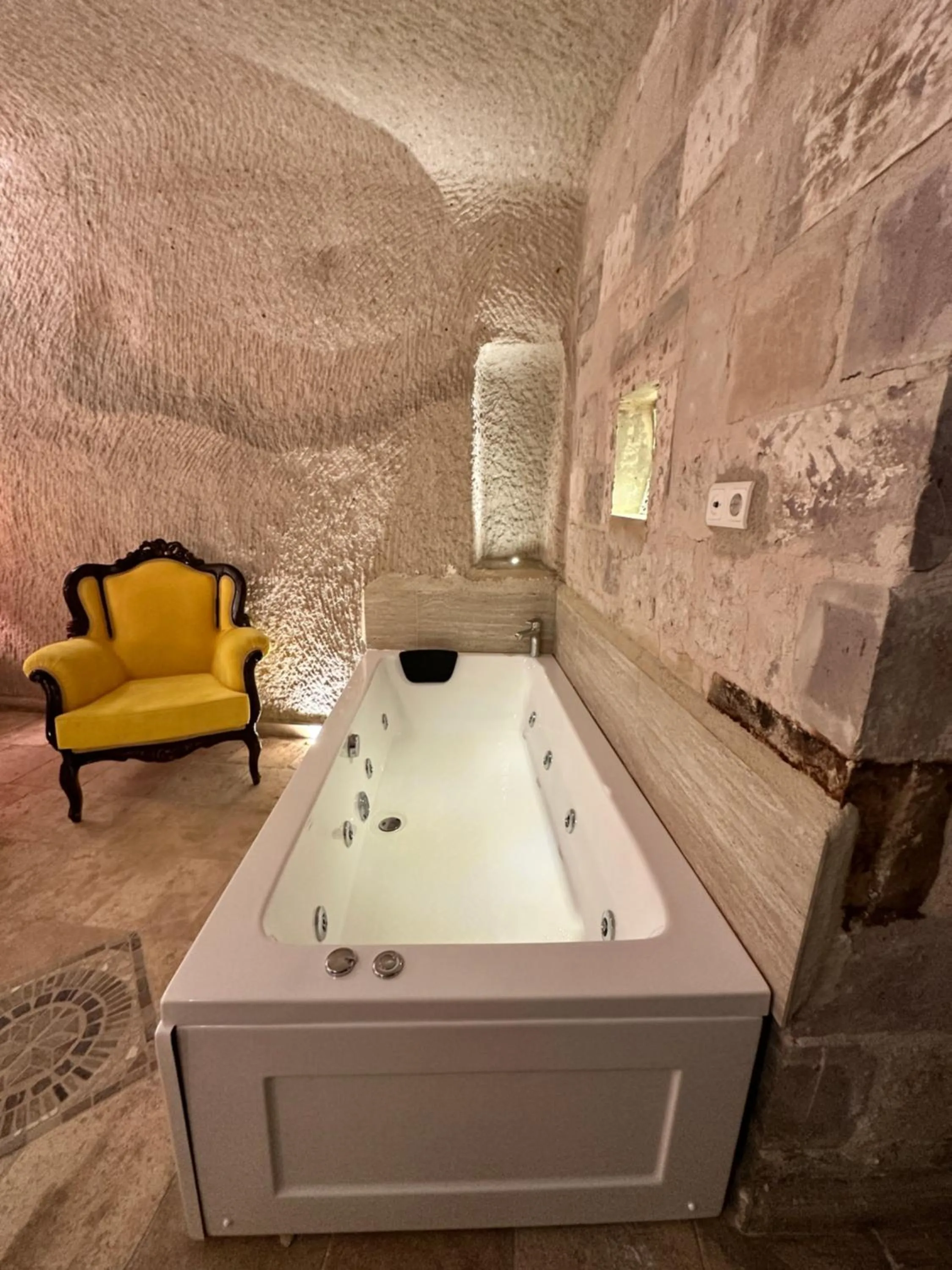 Bath in Bedrock Cave Hotel