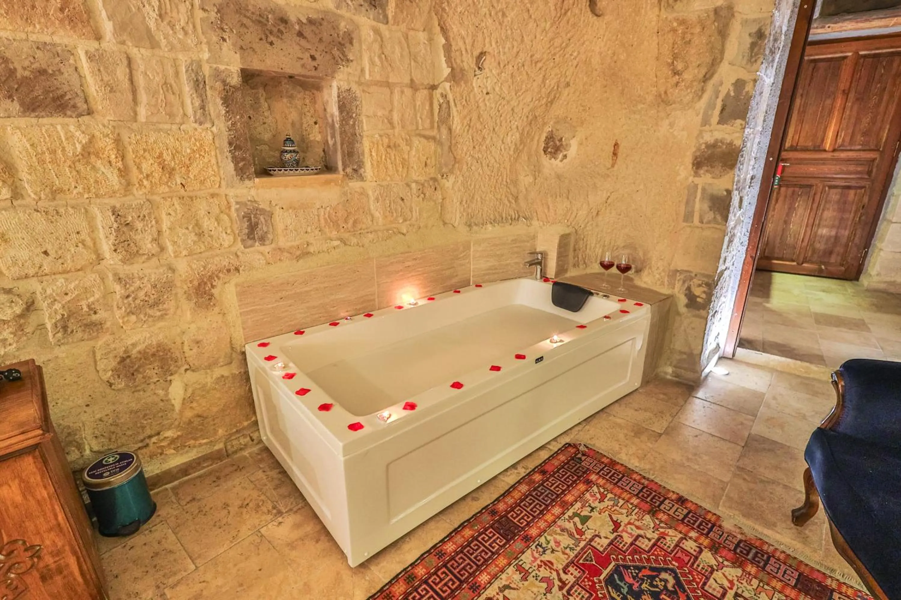 Bed in Bedrock Cave Hotel