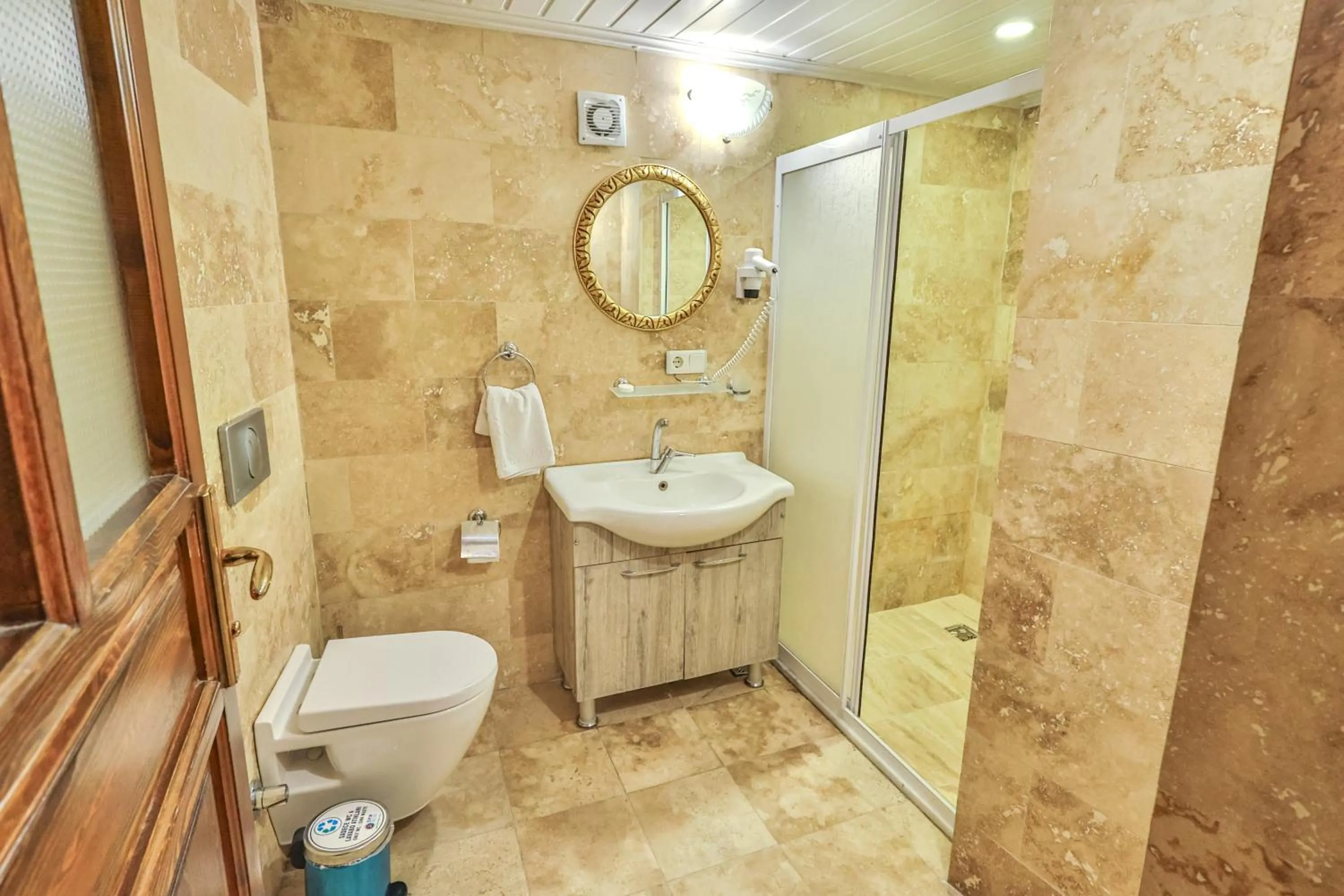 Shower in Bedrock Cave Hotel