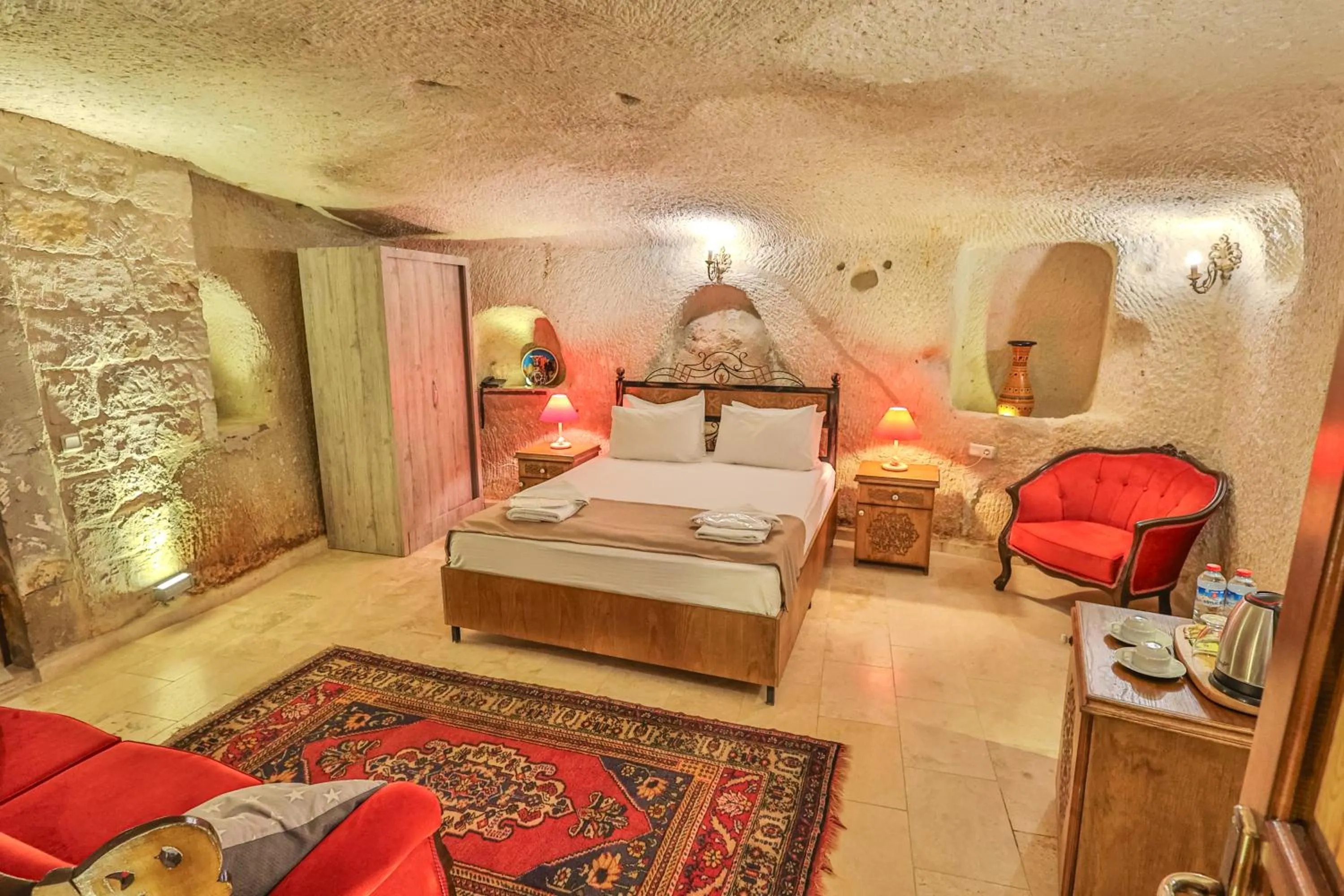 Bed in Bedrock Cave Hotel