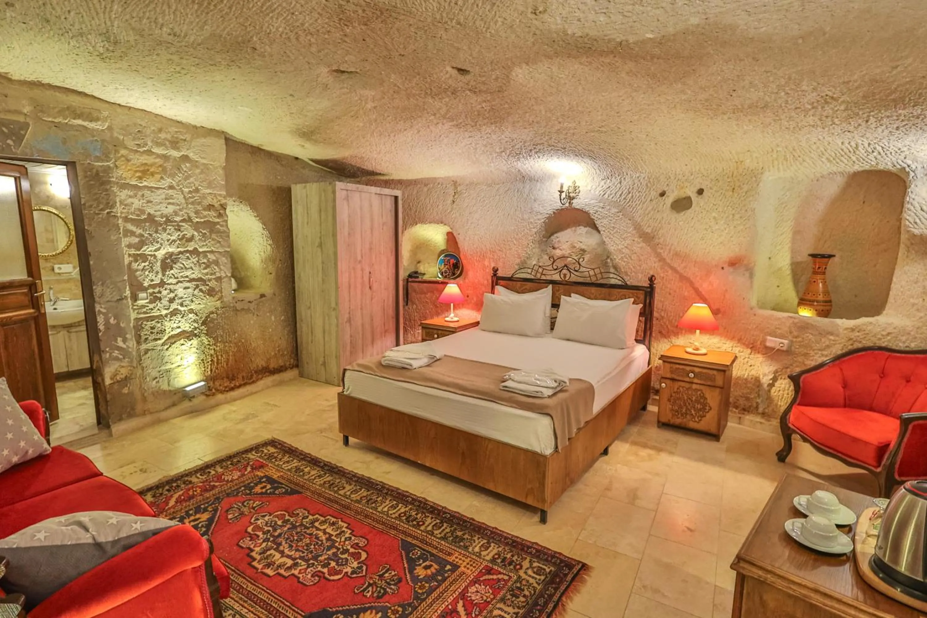 Bed in Bedrock Cave Hotel