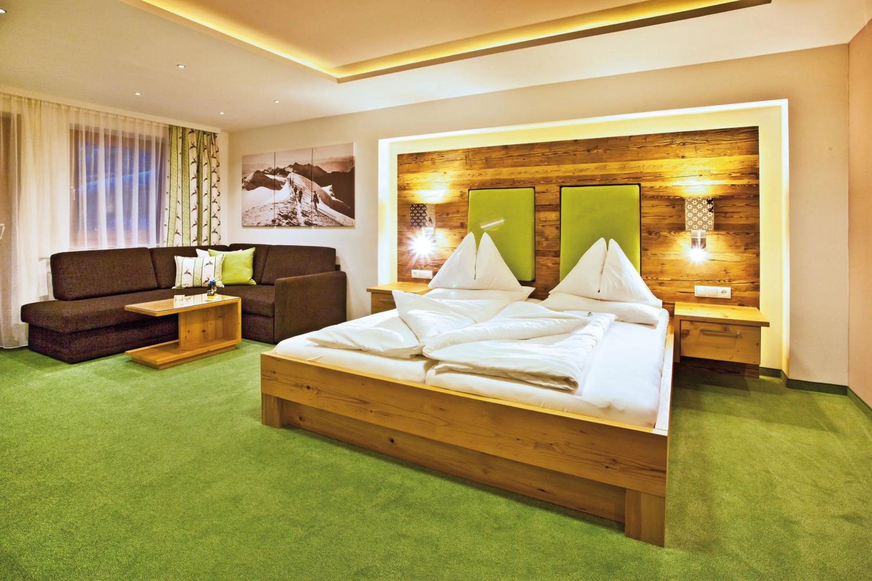 Photo of the whole room, Bed in Landhotel Alpenhof Filzmoos