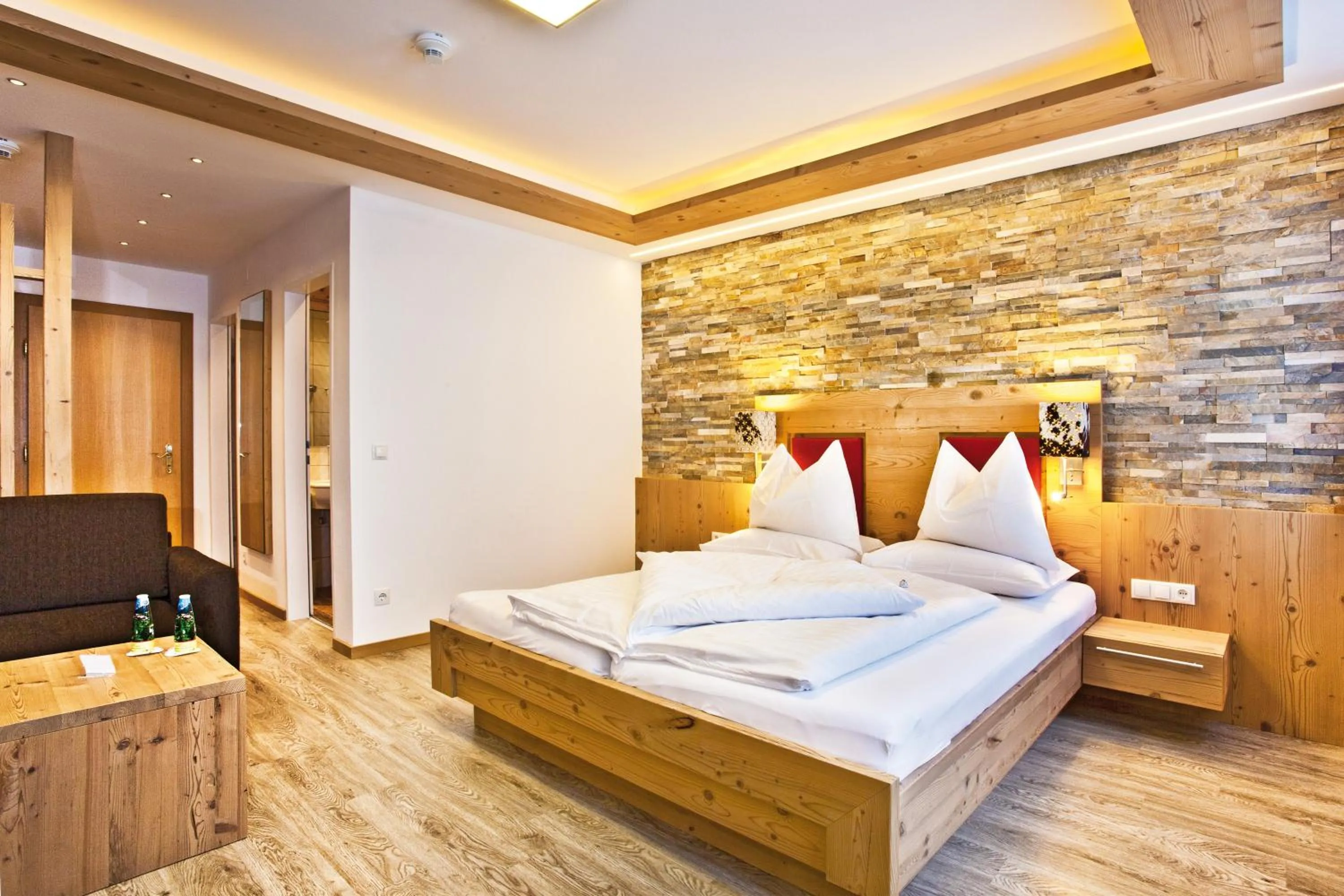 Photo of the whole room, Bed in Landhotel Alpenhof Filzmoos