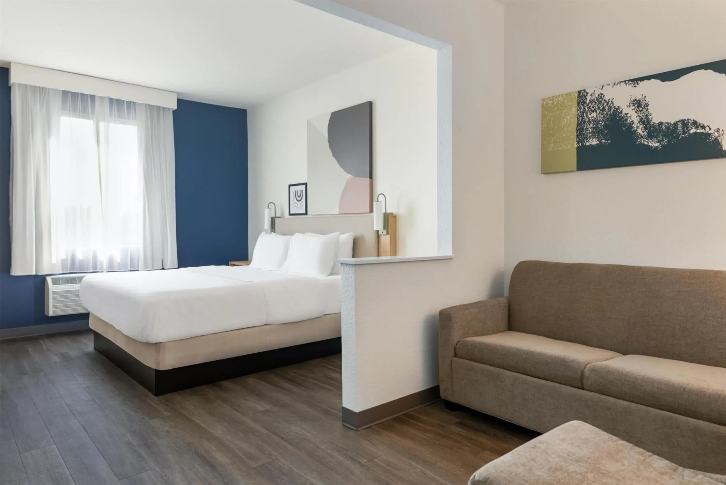 Living room, Bed in Spark by Hilton Indianapolis Northeast Fishers Living room, Bed in Spark by Hilton Indianapolis Northeast Fishers