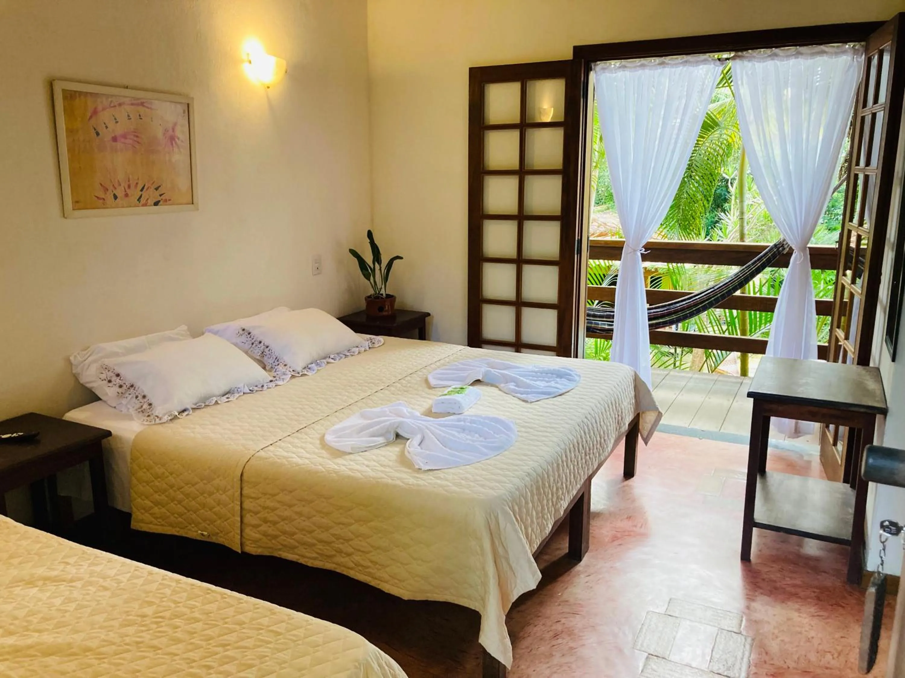 Bed in Pousada Rumo dos Ventos