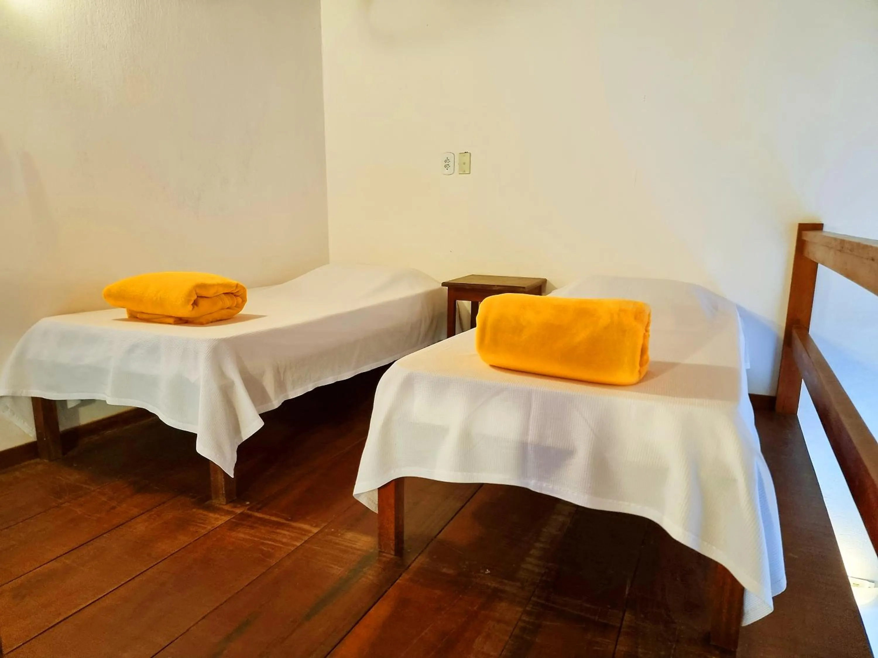 Bed in Pousada Rumo dos Ventos