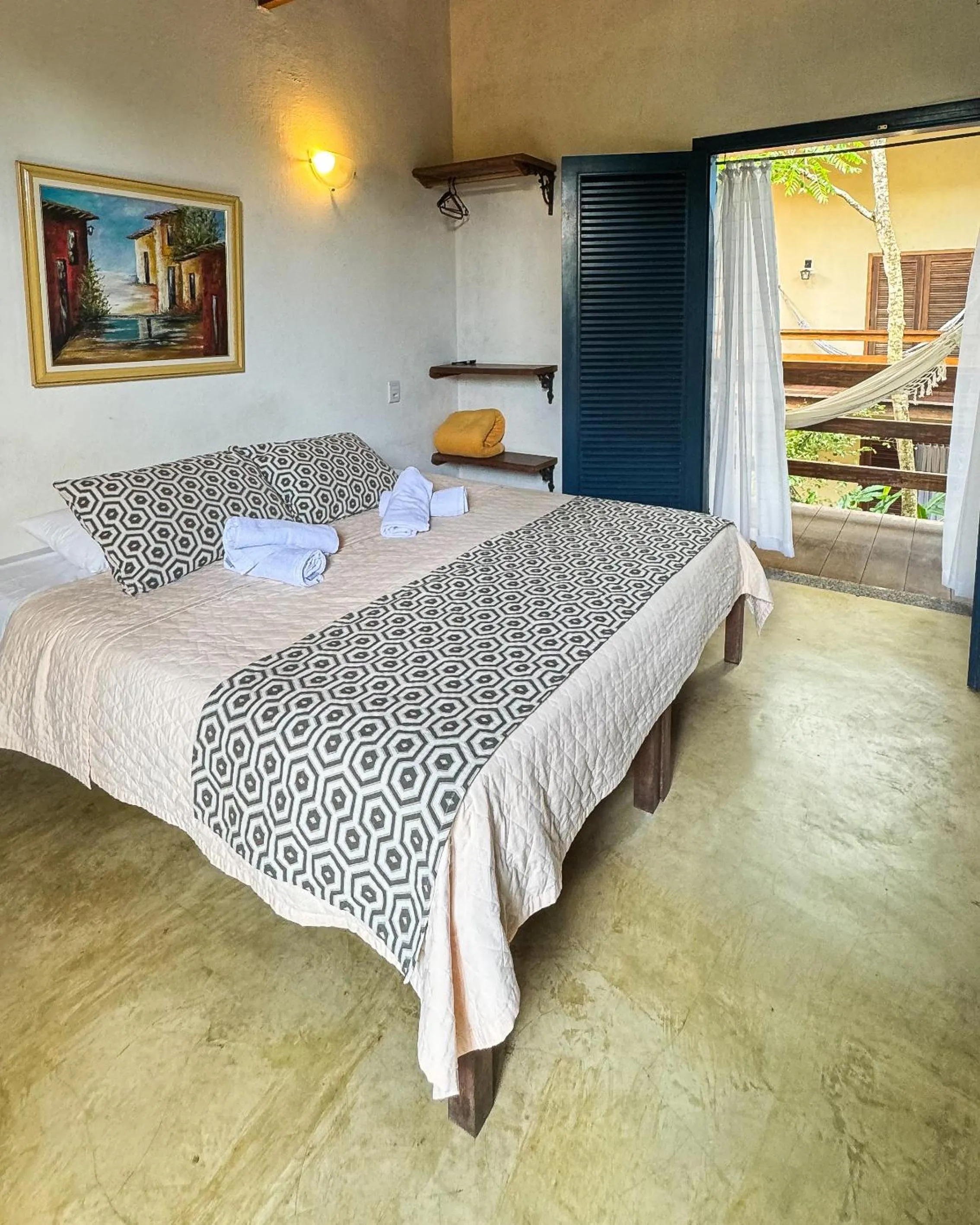 Bed in Pousada Rumo dos Ventos