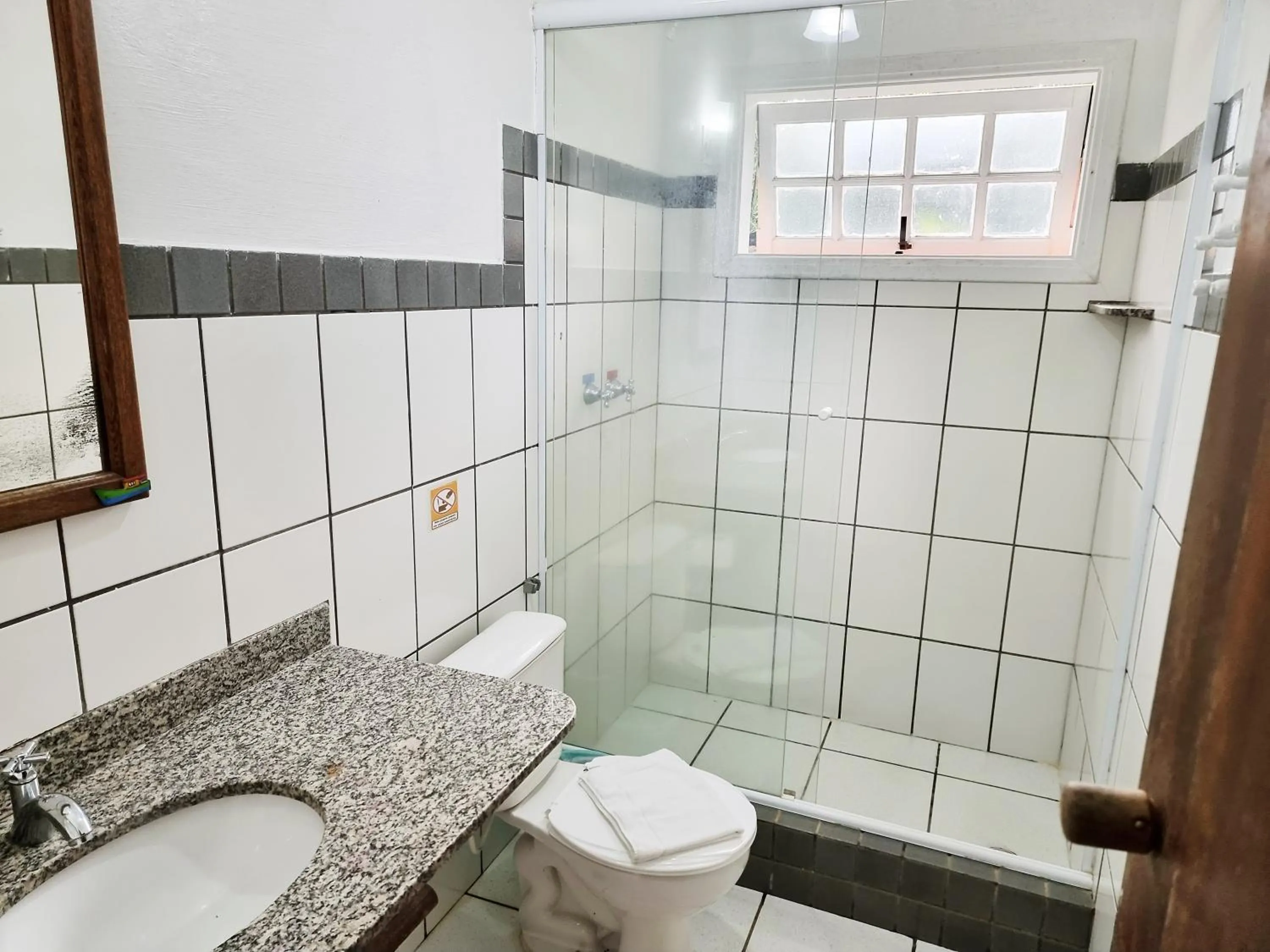 Toilet in Pousada Rumo dos Ventos