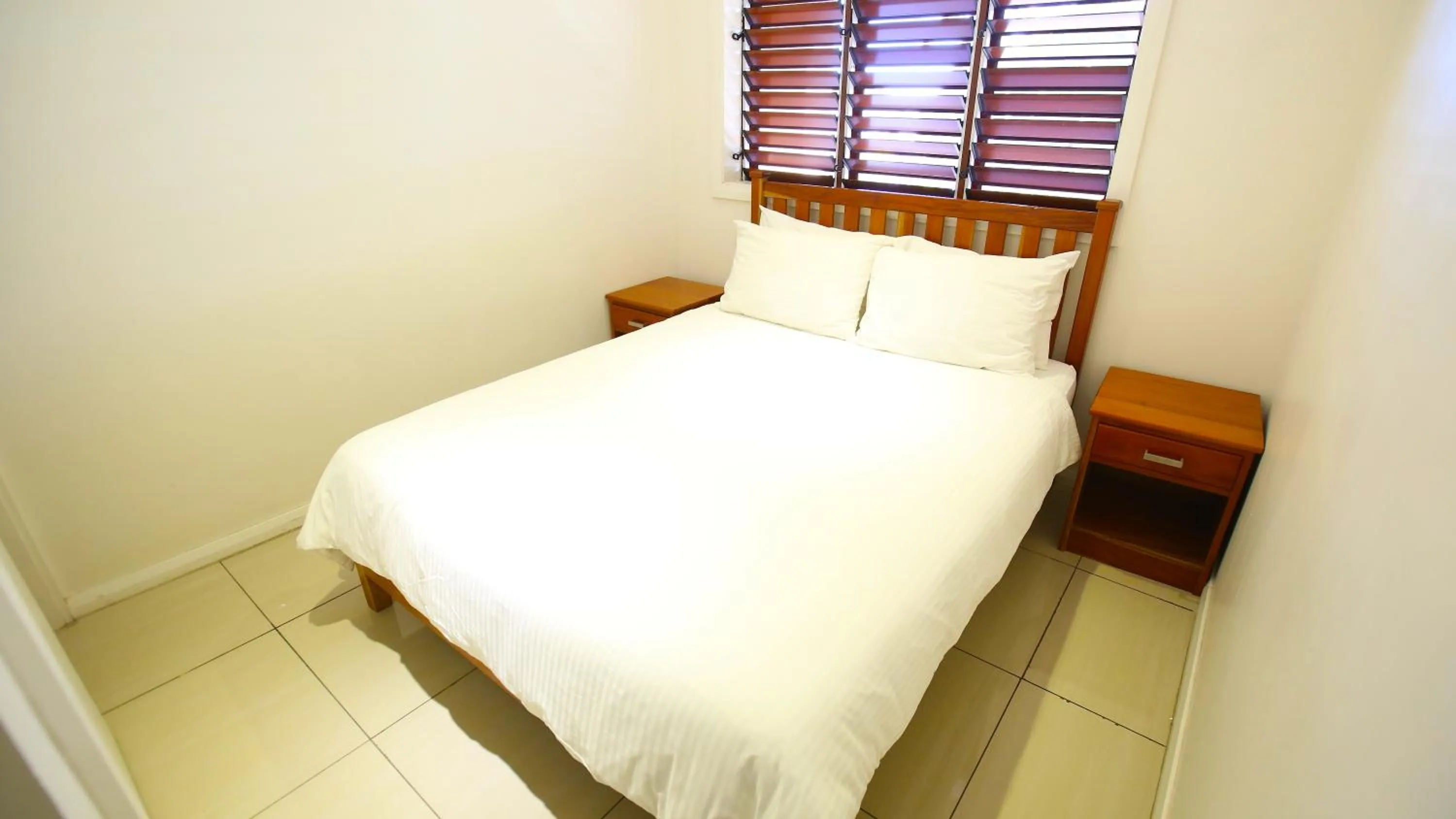 Bed in Premiere Apartments