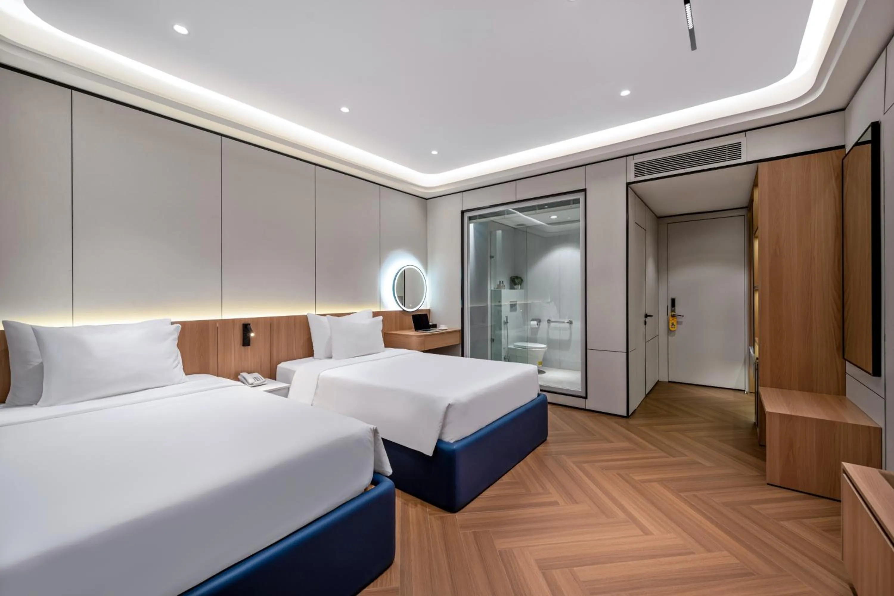 Bed in BlueSun Danang Beach Hotel