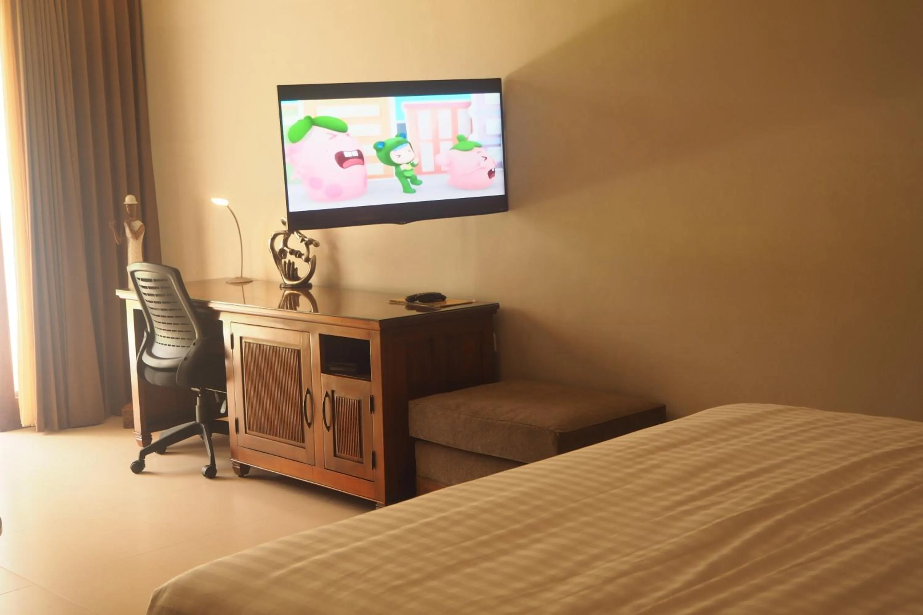 Seating area, Bed in The Gecho Inn Country